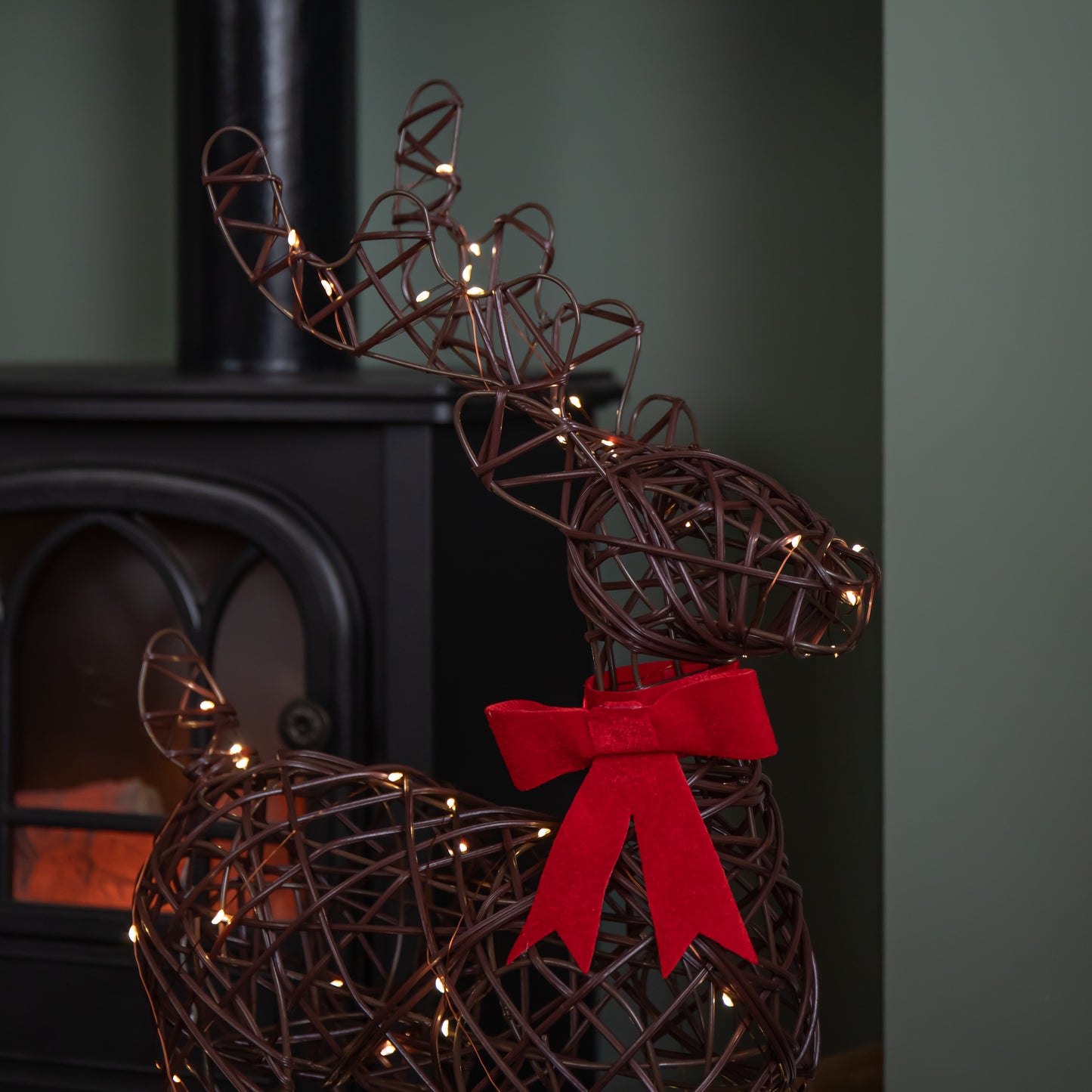 60cm Battery Operated Light up Christmas Reindeer with Red Bow & Warm White LEDs