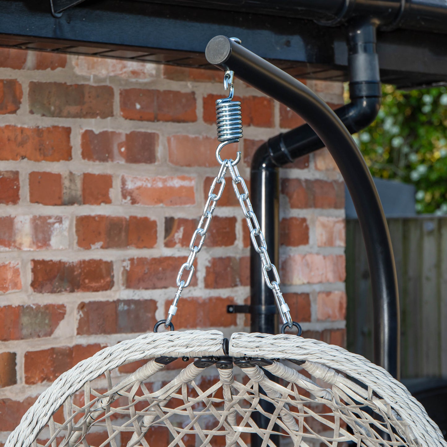 Samuel Alexander Hanging Garden Rattan Egg Chair with Steel Frame and Waterproof Cover in Indigo