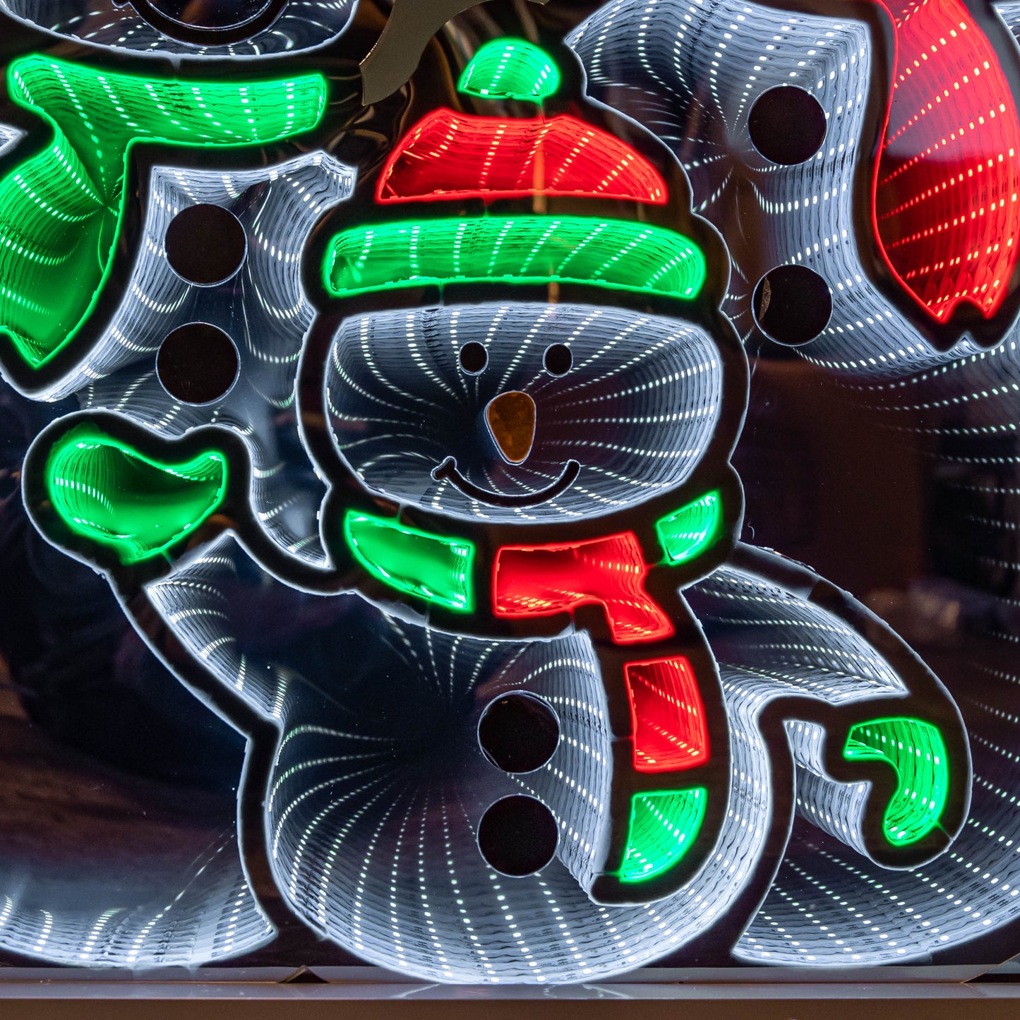 65cm Infinity Standing Snowmen Family on Metal Base with White, Red & Green LEDs