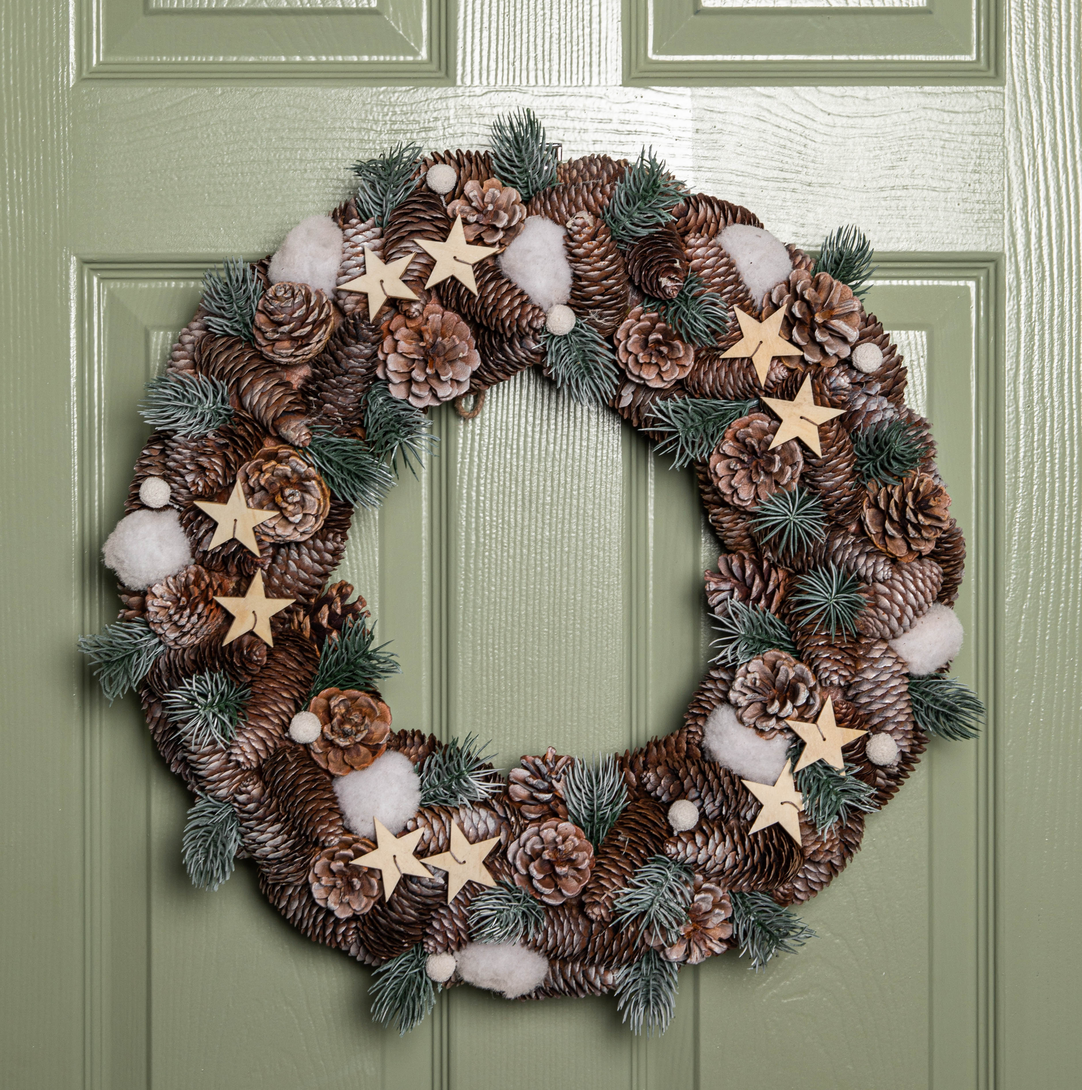 50cm Frosted Hanging Christmas Wreath with Pine Cones & Wooden Stars