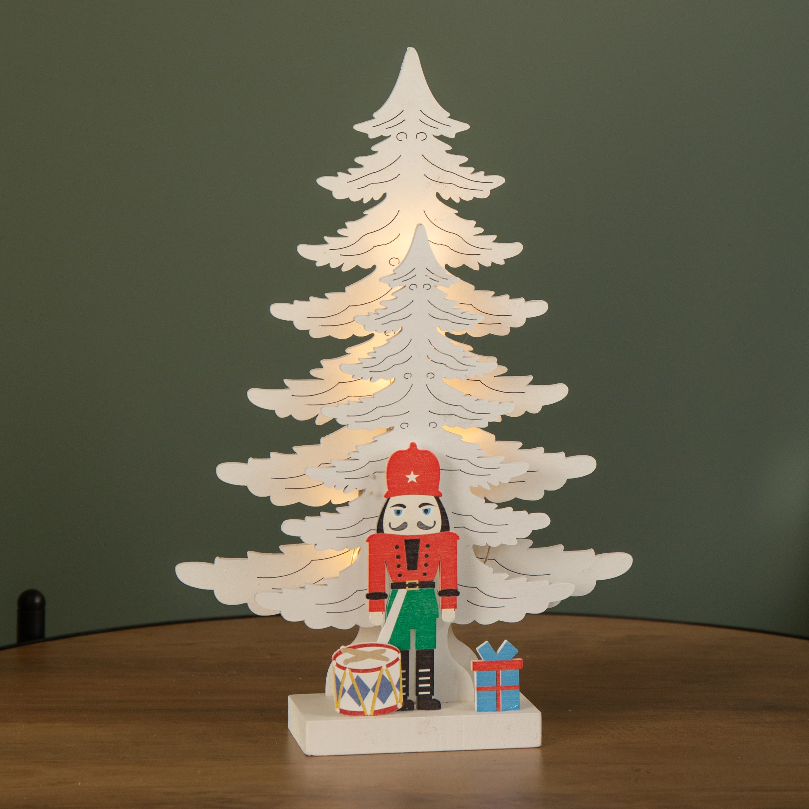 25cm LED Battery Operated Nutcracker with White Wooden Christmas Tree Scene