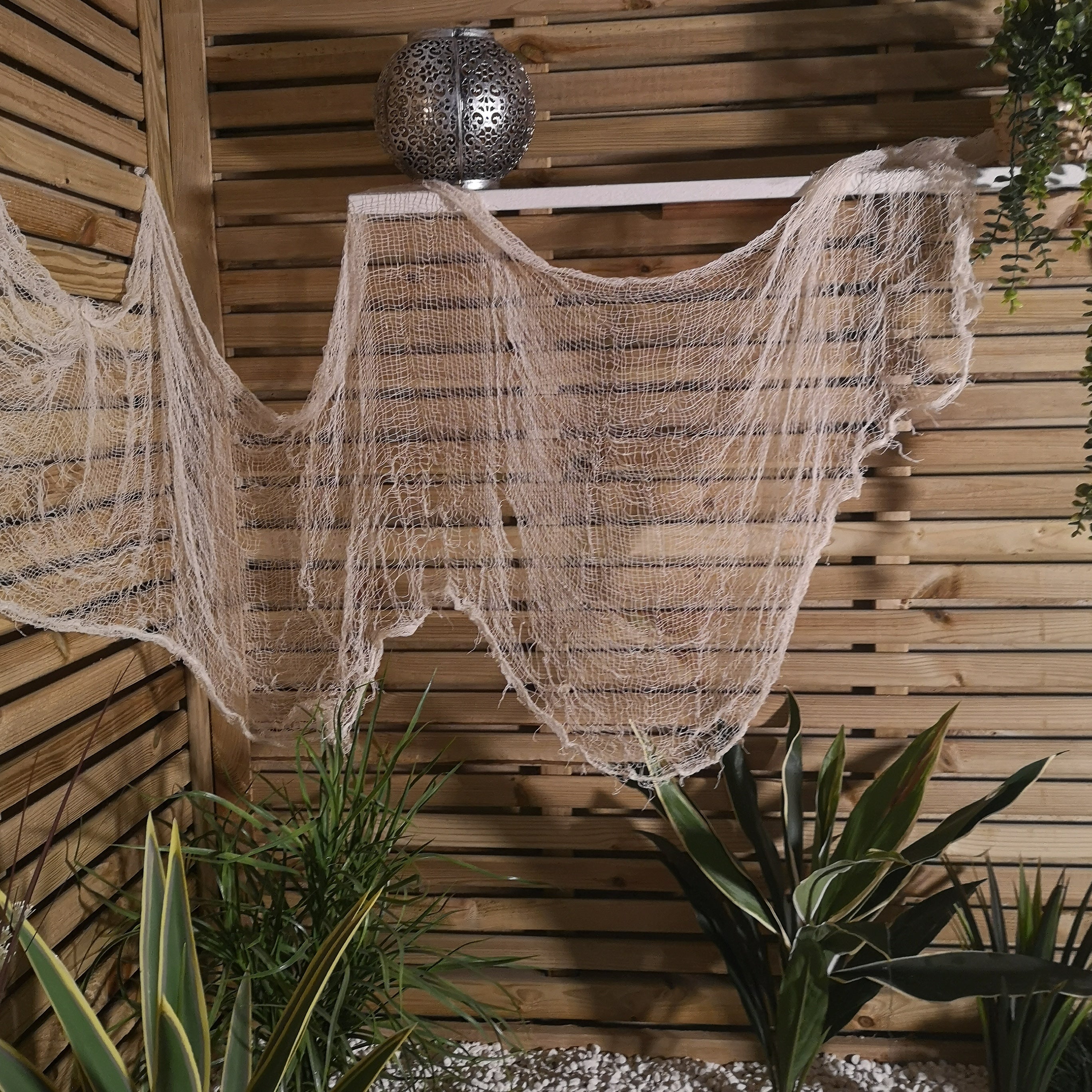 Pack of 12 2.9m Halloween Freaky Fabric Net Decoration in Cream