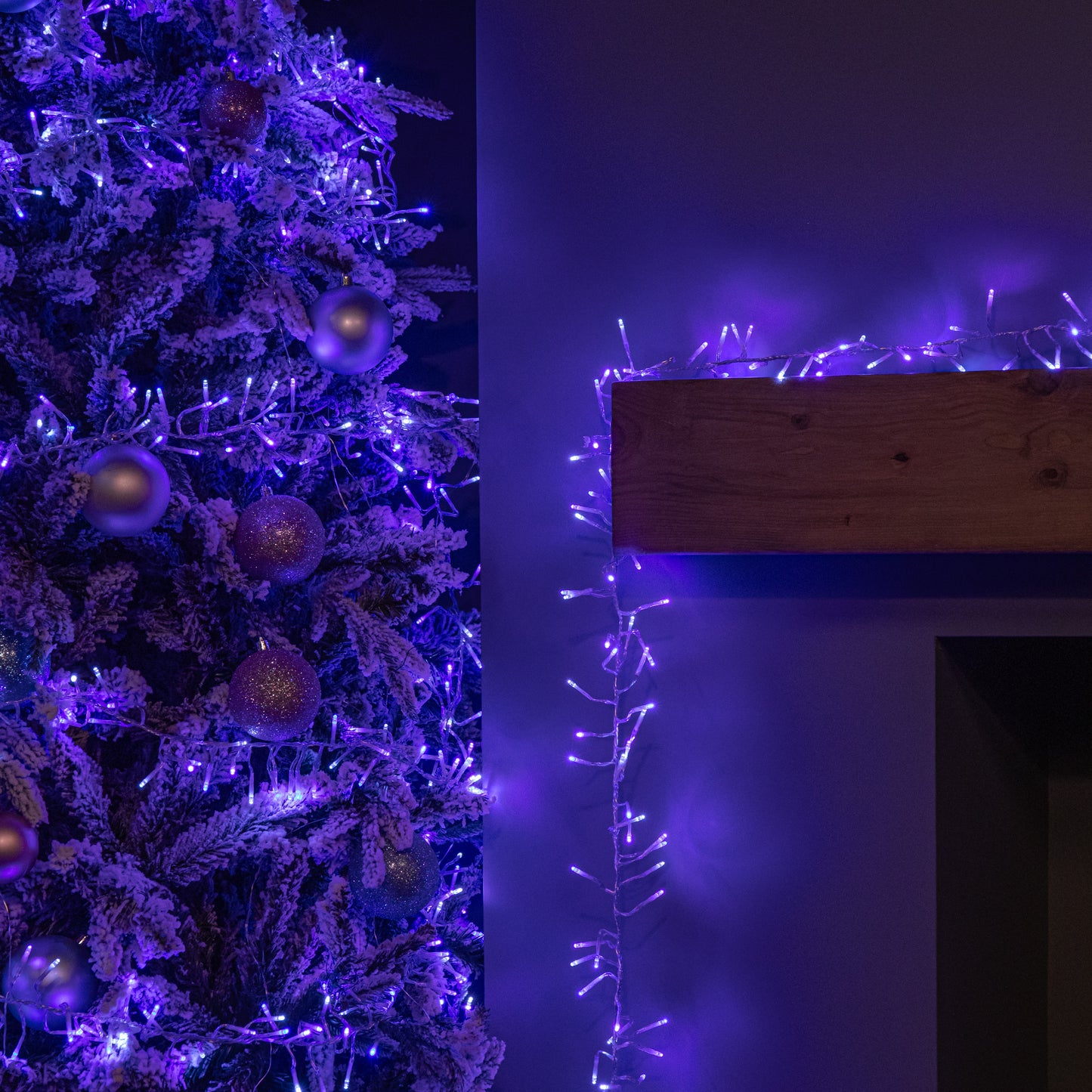 9.3m 720 LED Christmas Cluster String Lights with Timer in Blue, Purple & White on Clear Cable
