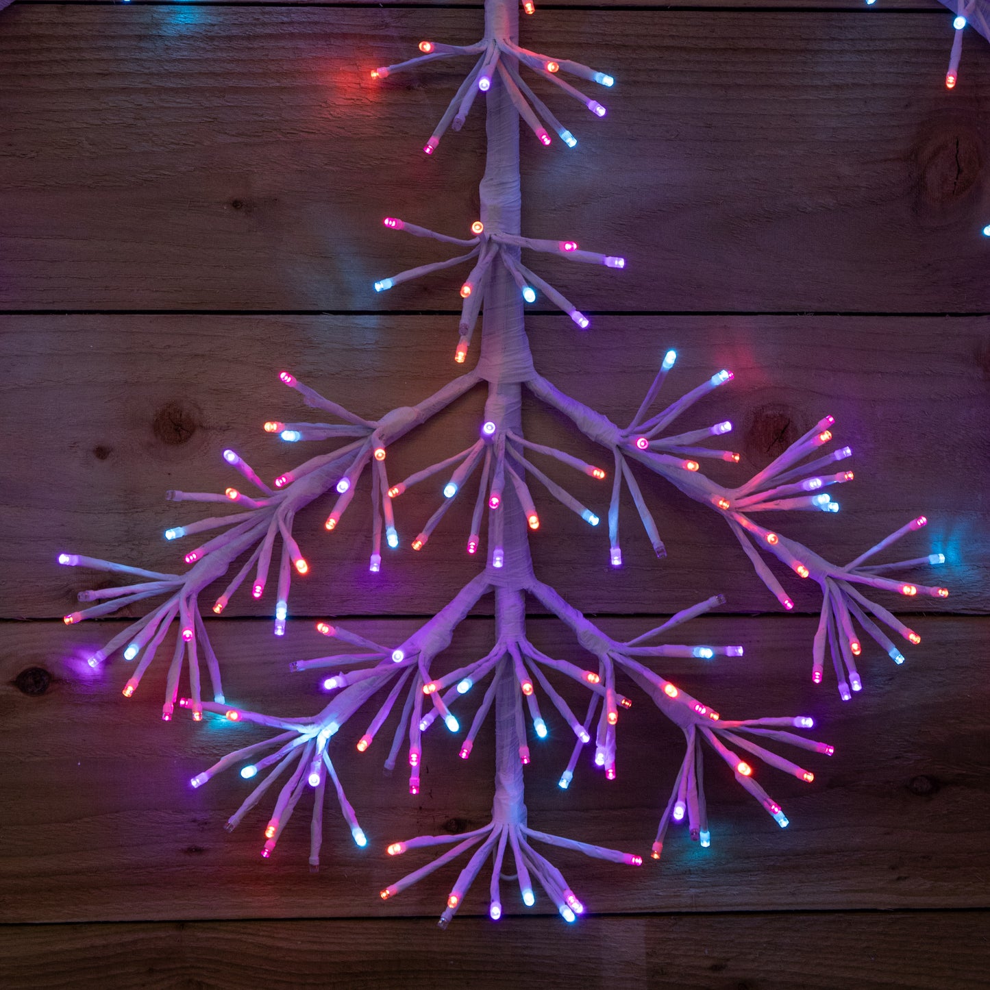 1.2m Twinkling Starburst Snowflake Christmas decoration with 960 Rainbow LEDs
