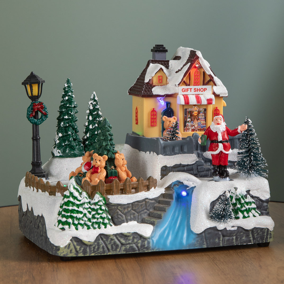 18cm Light up Christmas Gift Shop Snow Scene with Music and LEDs