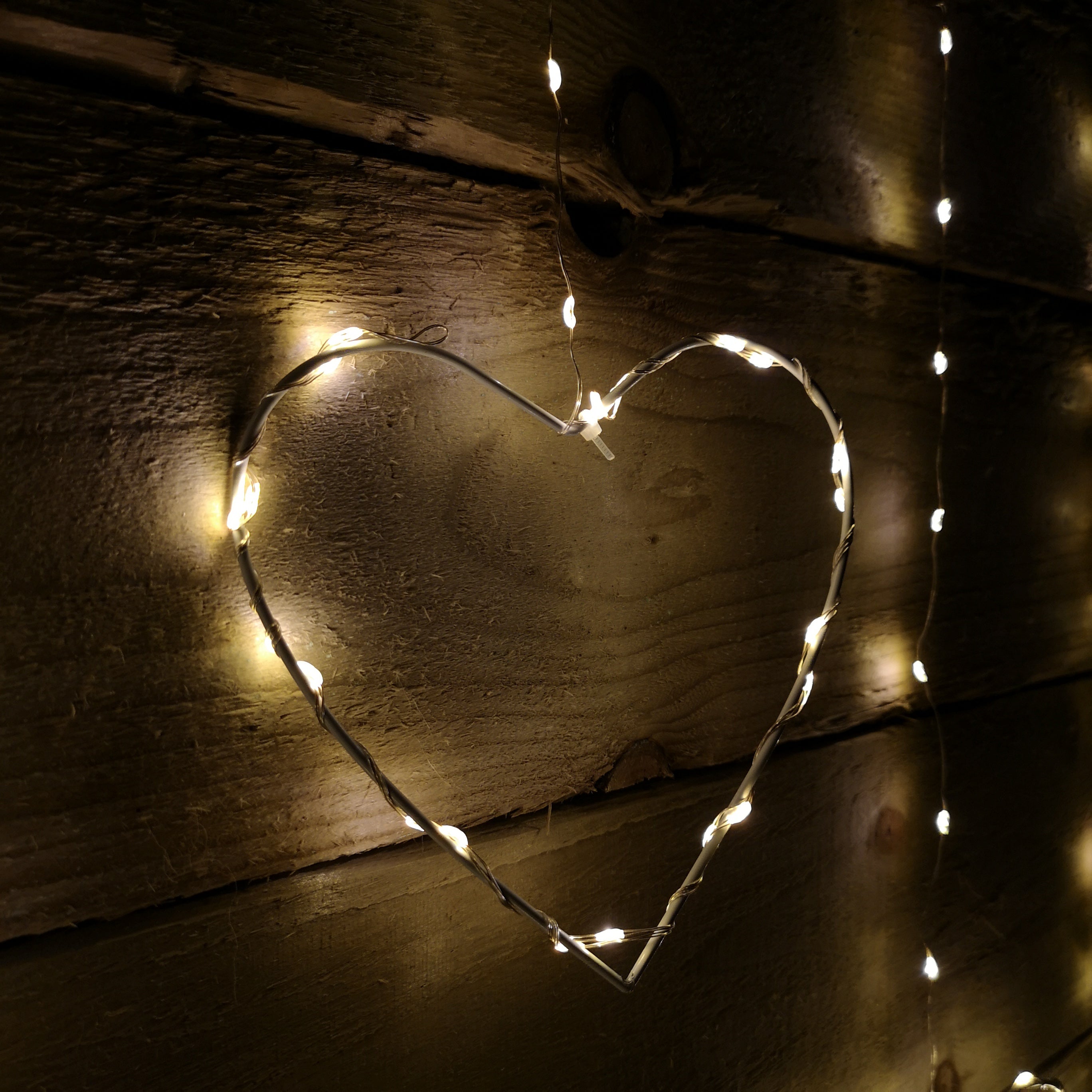 1.2m Premier Christmas Static Heart LED Silver Pin Wire V Curtain Lights in Warm White