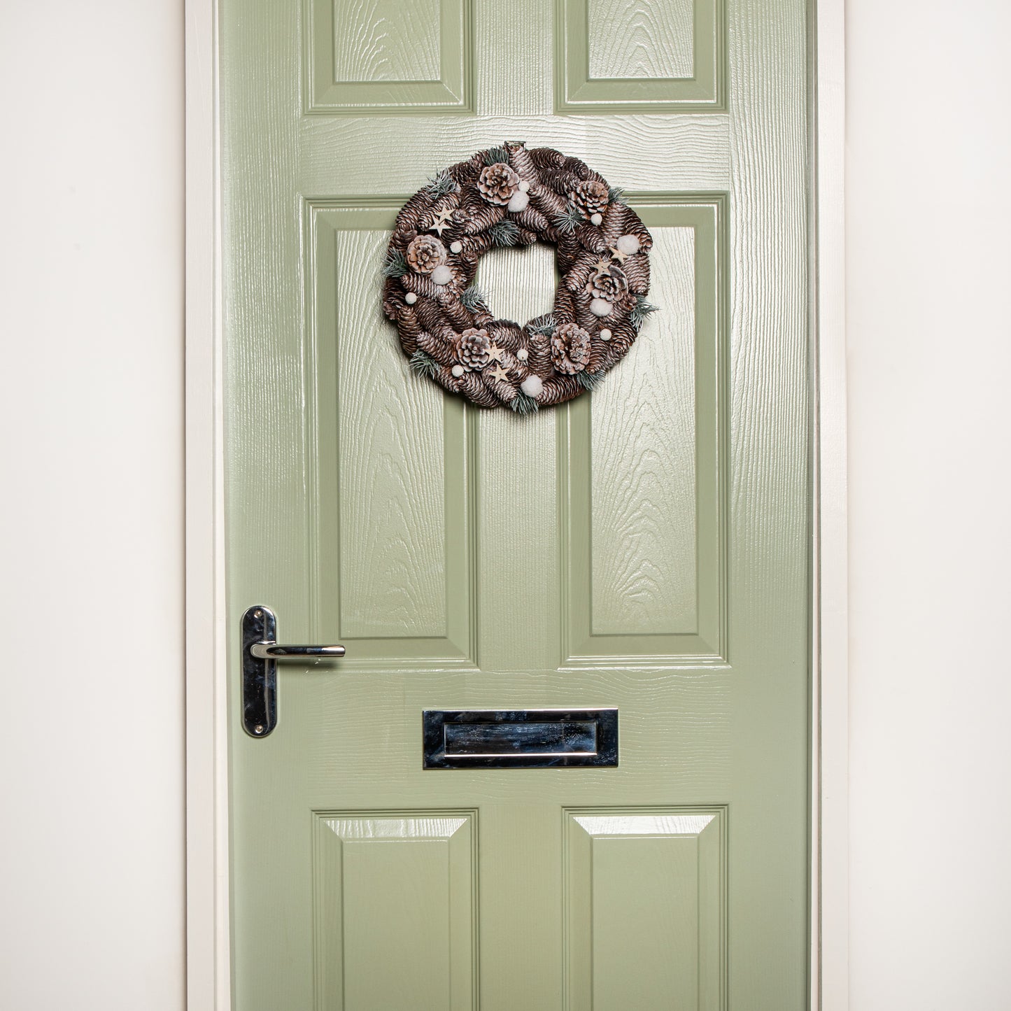 36cm Frosted Hanging Christmas Wreath with Pine Cones & Wooden Stars
