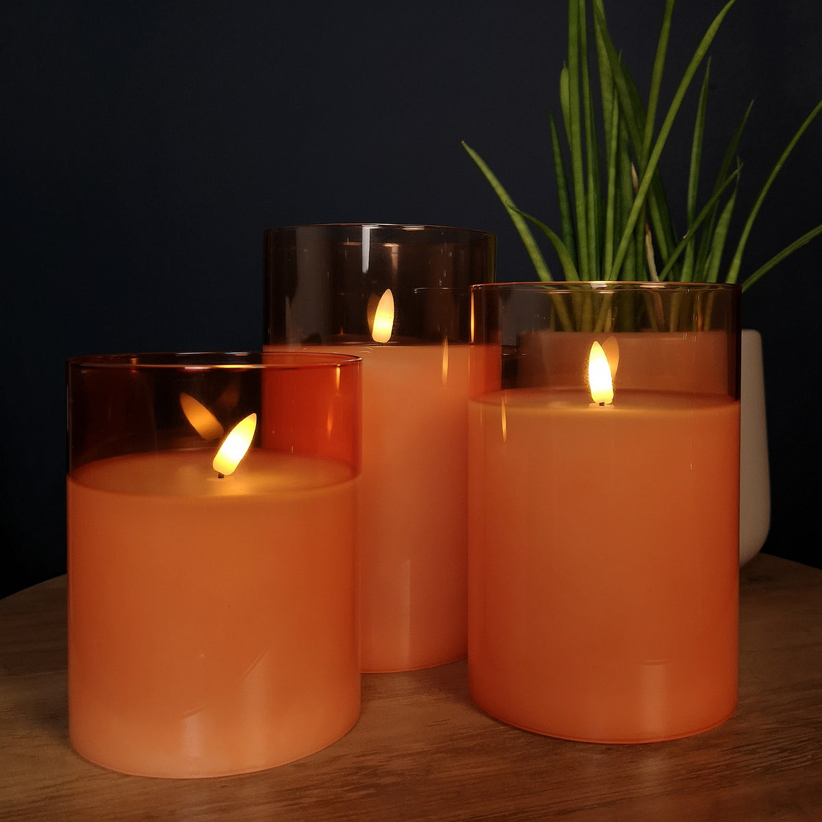 Set of 3 Warm White Battery Operated Christmas Wax Candles with Timer in Peach Glass