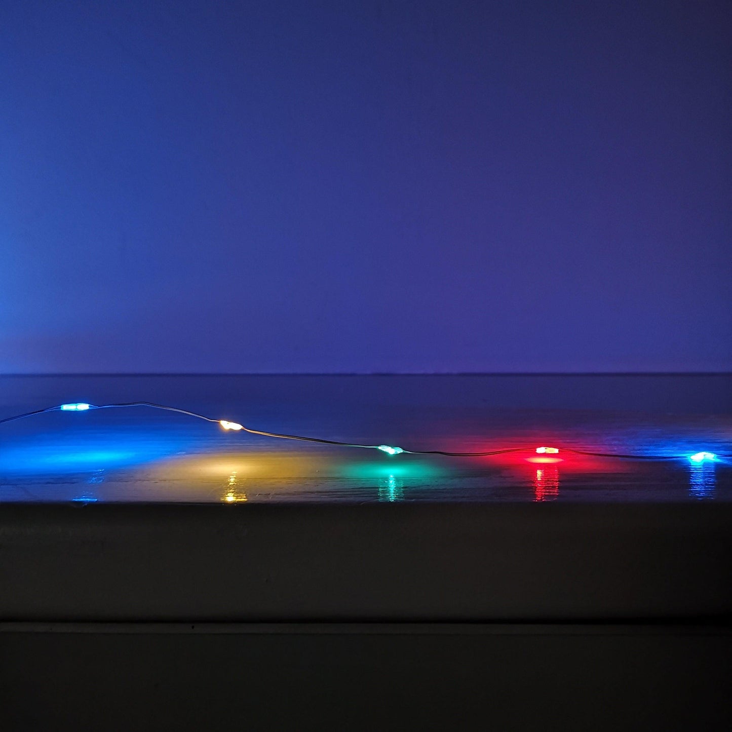 200 LED 10m Premier MicroBrights Indoor Outdoor Christmas Multi Function Battery Operated Lights with Timer on Pin Wire in Multicoloured