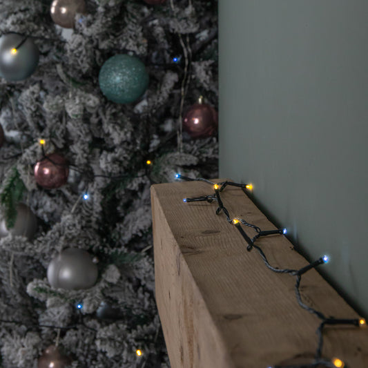 60m Battery Operated Multi-Action Christmas String Lights with 600 Cool & Warm White LEDs