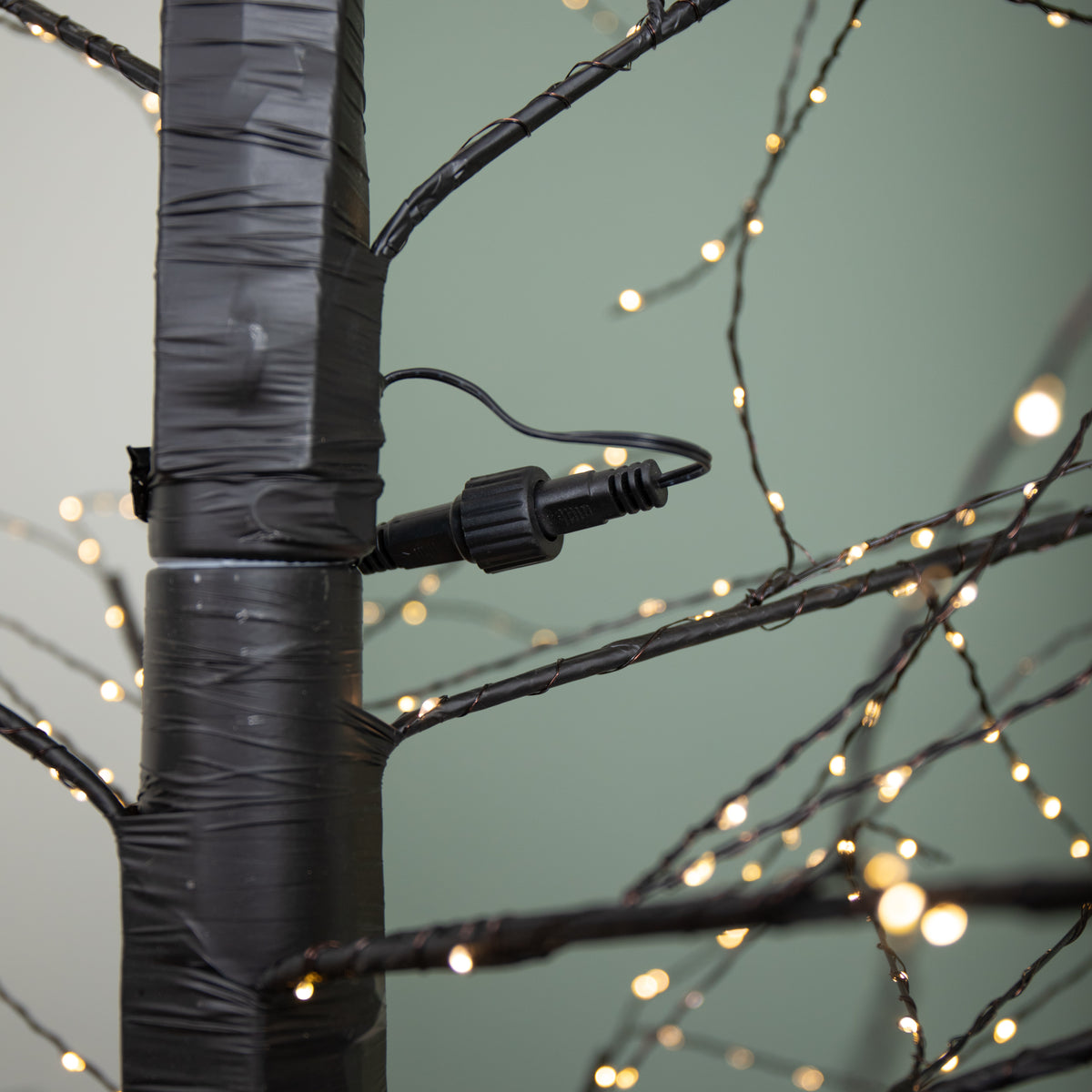 6ft (1.8m) Tall Light up Black Micro Dot Christmas Tree with 1100 Warm White LEDs and Remote Control