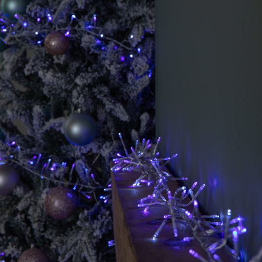 9.3m 720 LED Christmas Cluster String Lights with Timer in Blue, Purple & White on Clear Cable
