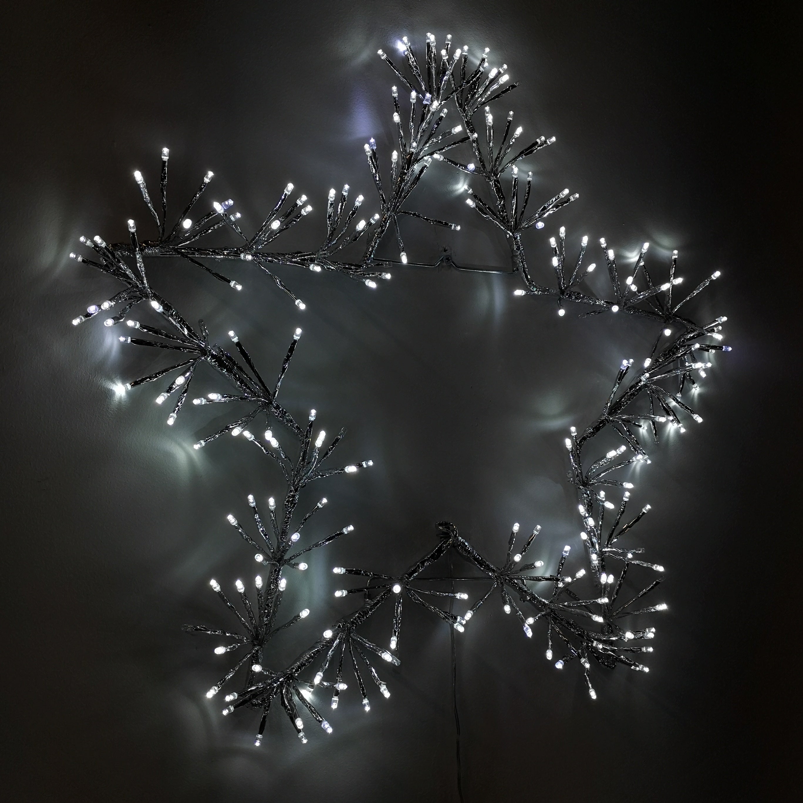 60cm Premier Twinkling LED Silver Star Silhouette Christmas Decoration in Cool White