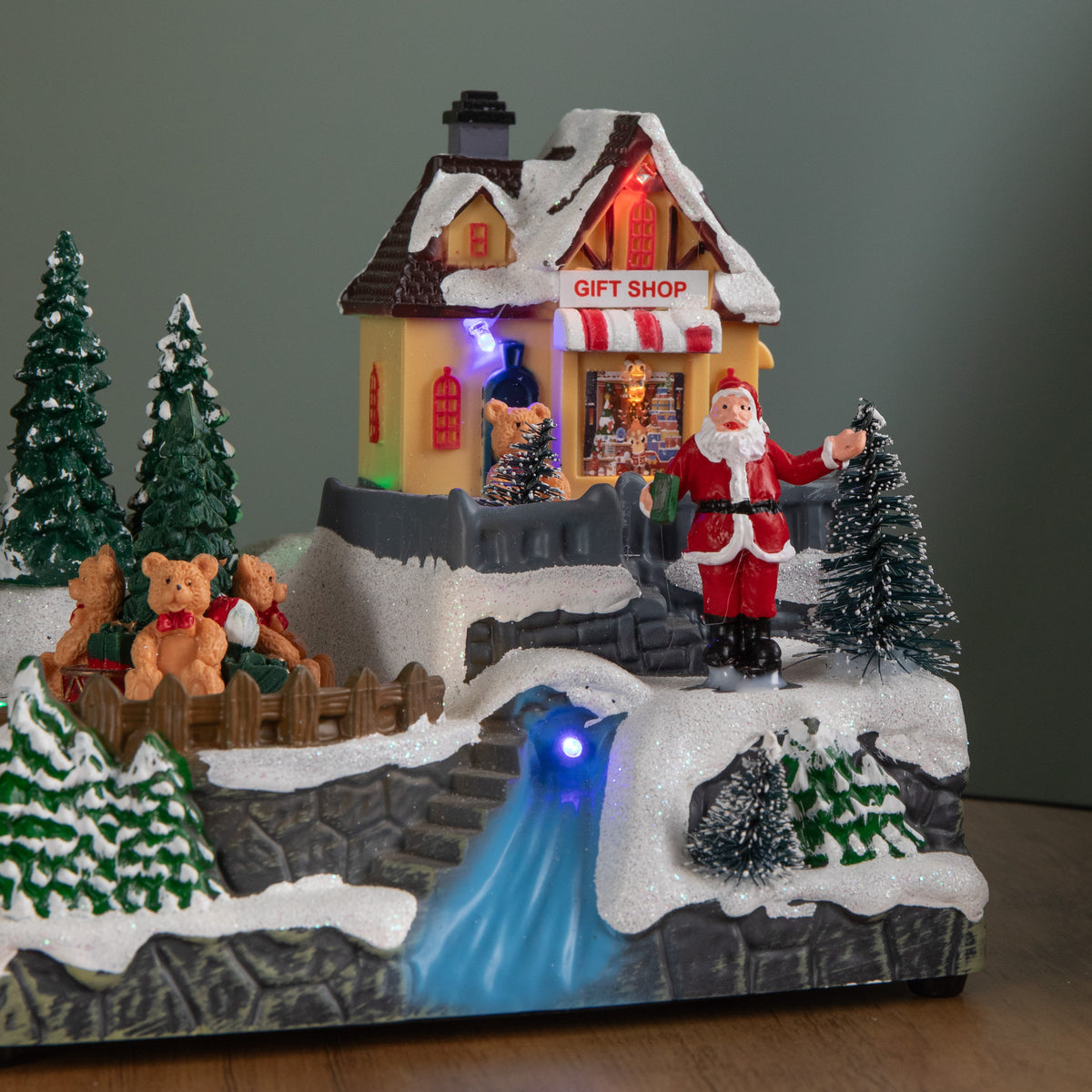 18cm Light up Christmas Gift Shop Snow Scene with Music and LEDs