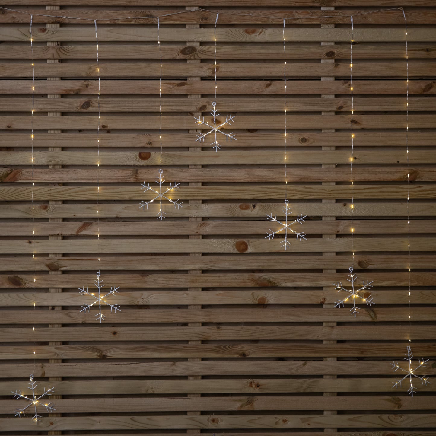 1.2m Battery Operated Snowflake Christmas Curtain Lights with 147 Warm White LEDs