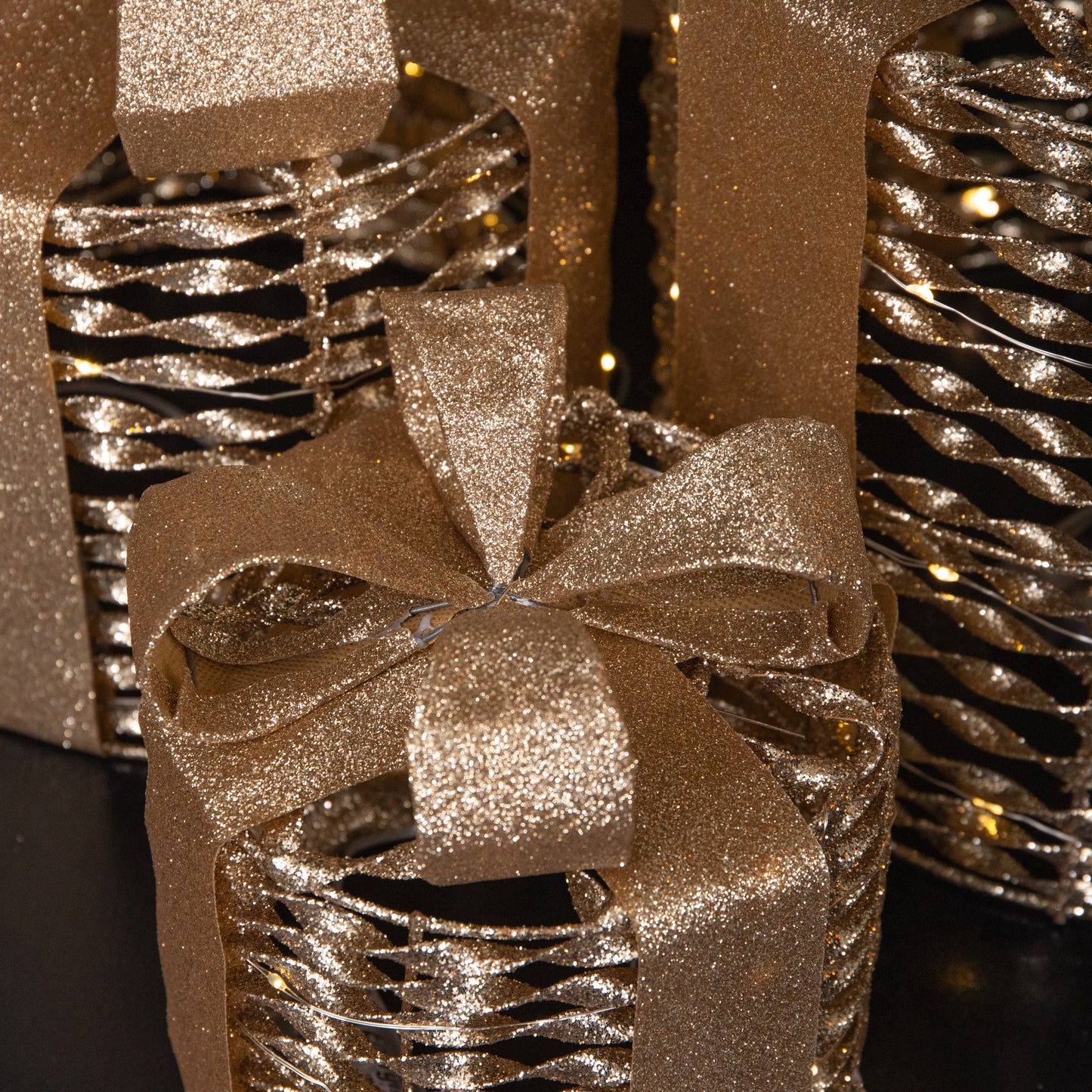 Set of 3 Battery Operated Gold Christmas Glitter Twist Gift Boxes with Warm White LEDs