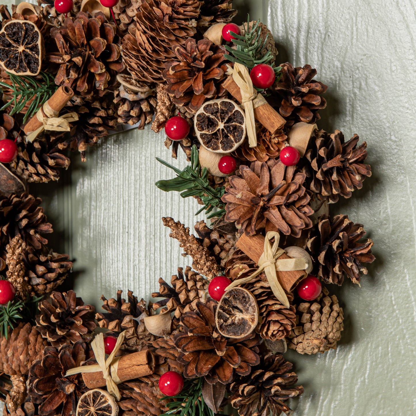 36cm Winter Spice Hanging Christmas Wreath with Pine Cones Red Berries & Dried Fruit