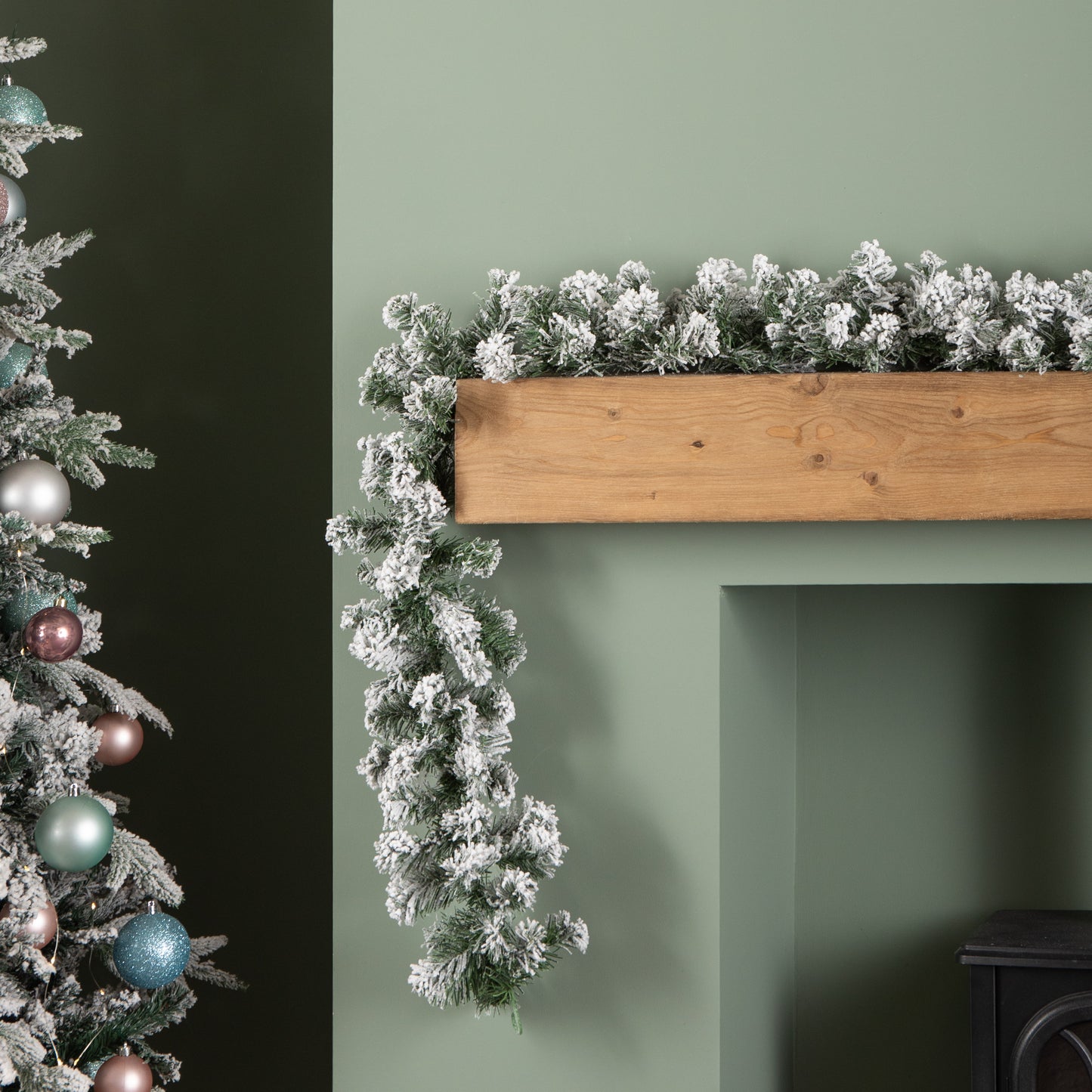 2.7m Green Snow Flocked Christmas Garland with 190 Tips