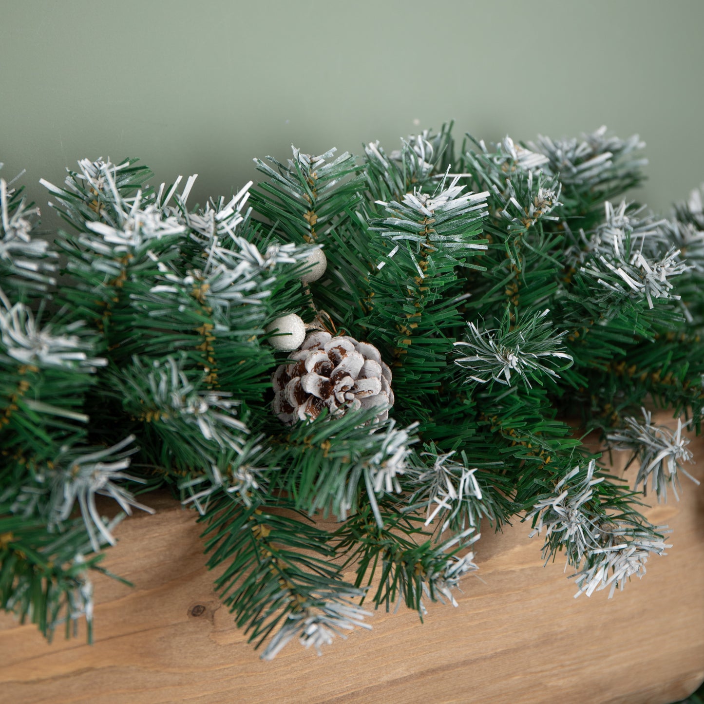 2.7m (9ft) Green Snow Tipped Christmas Garland with White Berries and Pine Cones