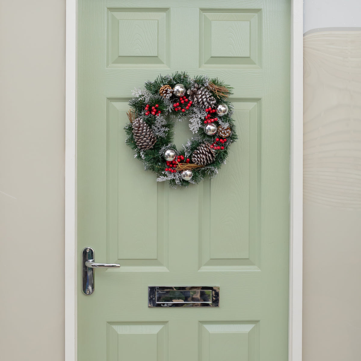 The Tree Company 40cm Festive Silver Dressed Christmas Wreath With Pinecones and Red Berries