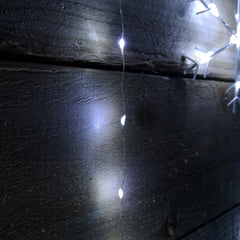 1.2m Premier Christmas Static Snowflake LED Silver Pin Wire V Curtain Lights in White