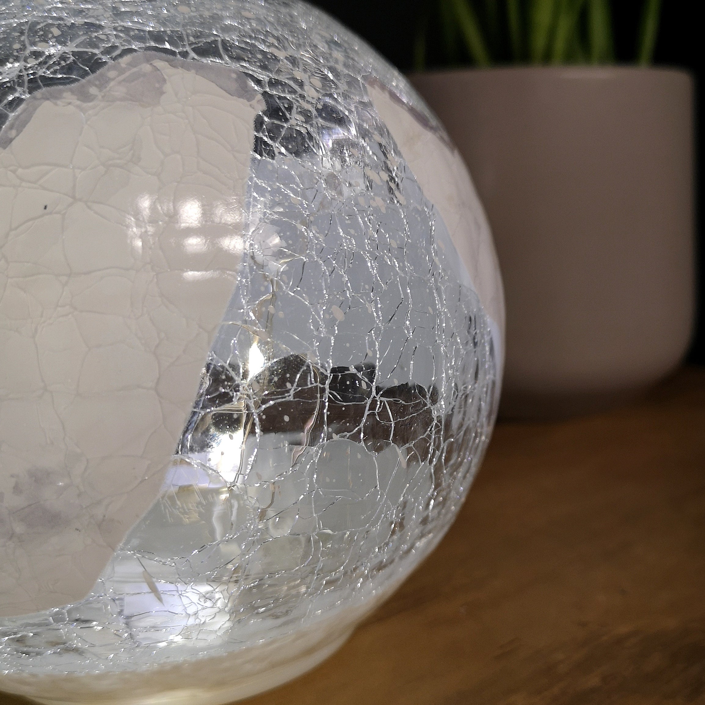 15cm Festive Christmas LED Crackle Effect Glass Penguin Scene Ball