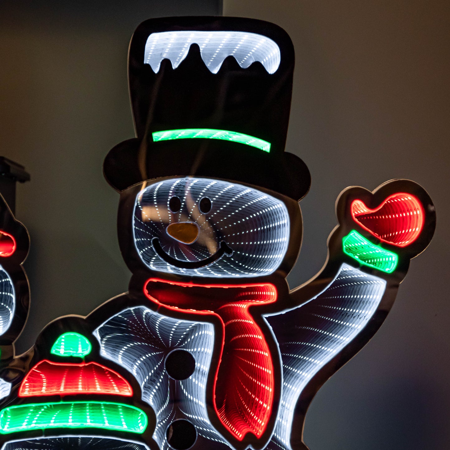 65cm Infinity Standing Snowmen Family on Metal Base with White, Red & Green LEDs