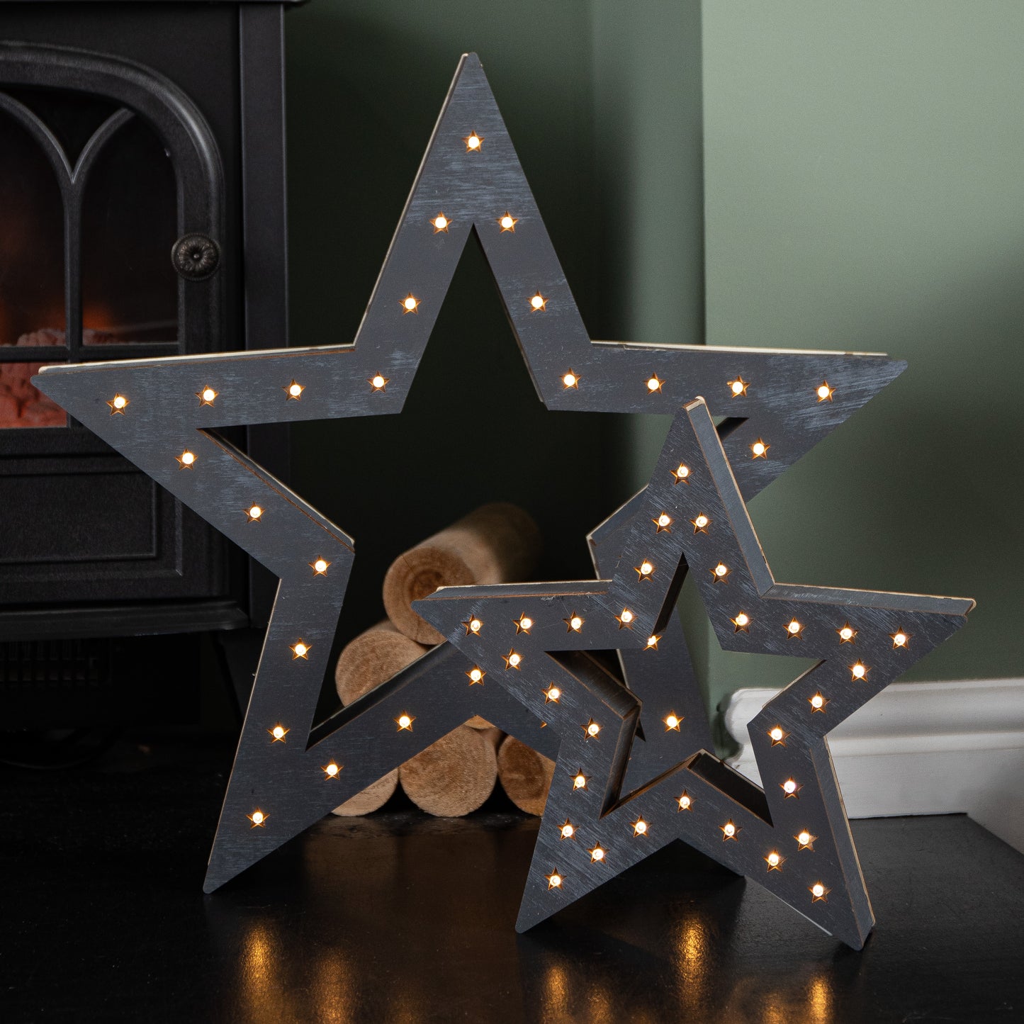 Set of 2 Battery Operated Light up Wooden Christmas Stars with 60 Warm White LEDs