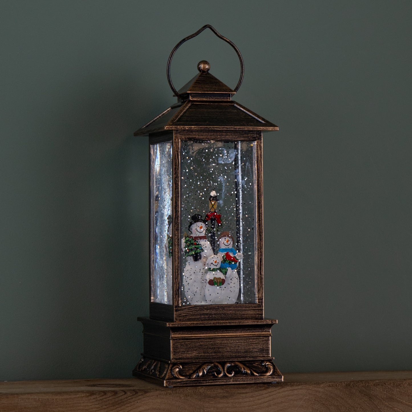 27cm Battery Operated Light up Bronze Christmas Water Spinner with Snowman Scene & LEDs