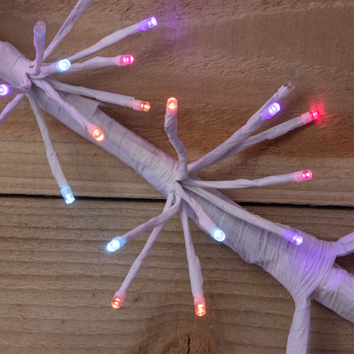 1.2m Twinkling Starburst Snowflake Christmas decoration with 960 Rainbow LEDs