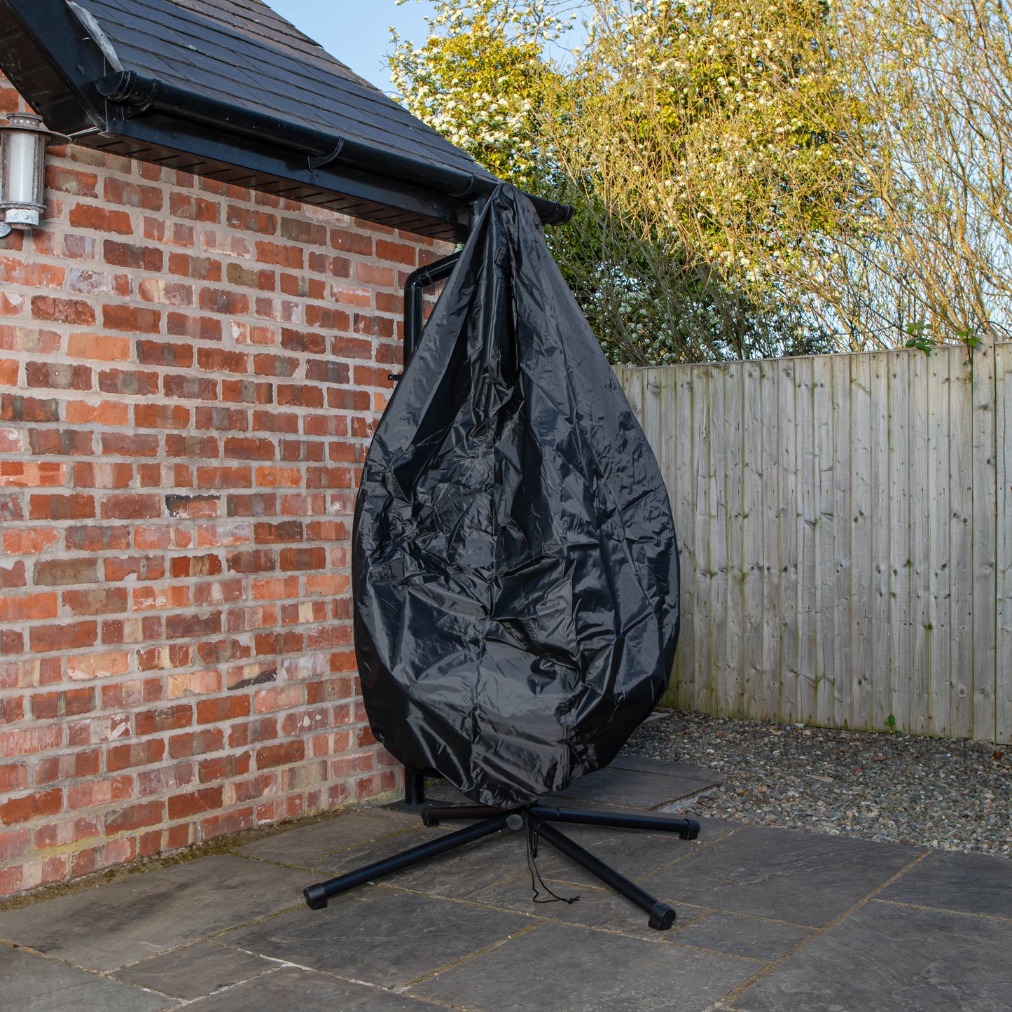 Samuel Alexander Hanging Garden Rattan Egg Chair with Steel Frame and Waterproof Cover in Indigo