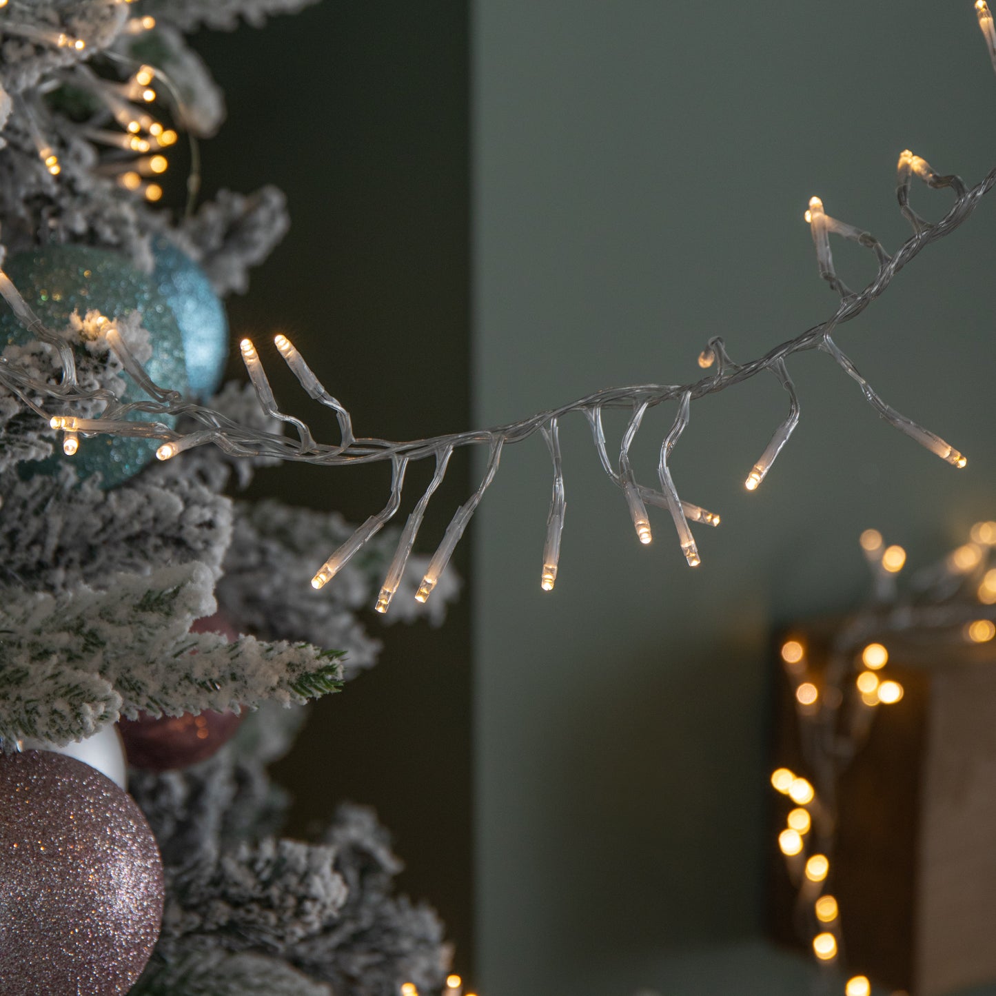 9.3m 720 LED Christmas Cluster String Lights with Timer in Warm White on Clear Cable