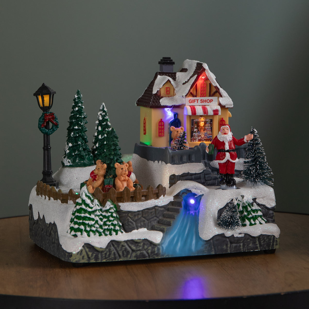 18cm Light up Christmas Gift Shop Snow Scene with Music and LEDs