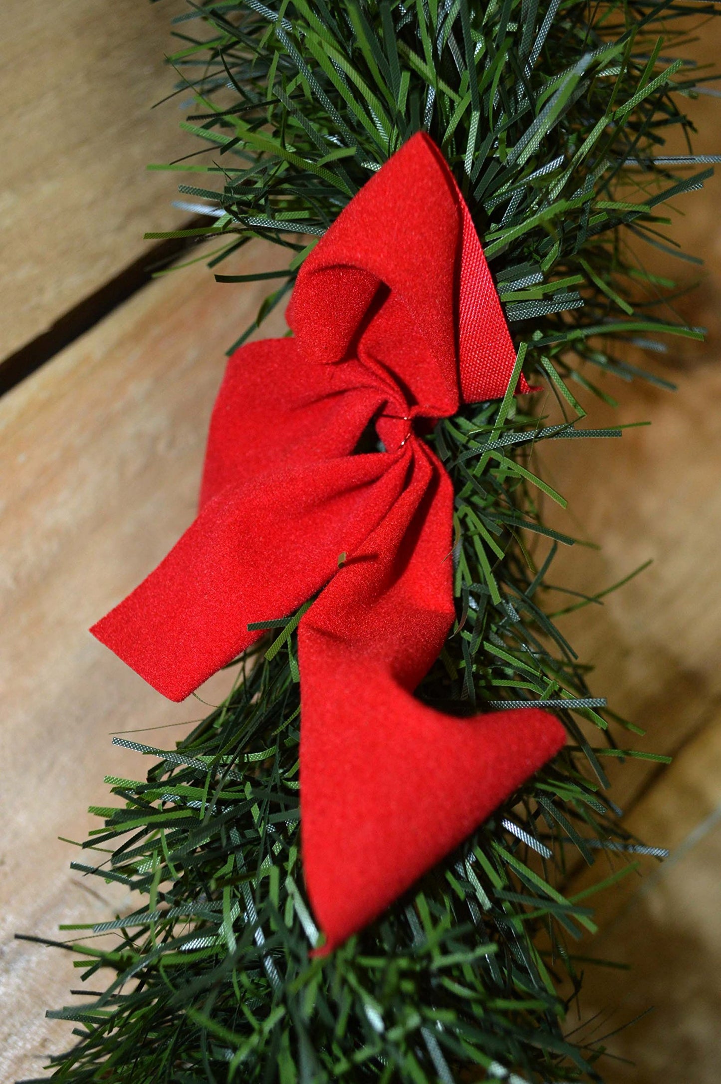 2.7m x 10cm Premier Christmas Green Tinsel with Red Bows Festive Decorative