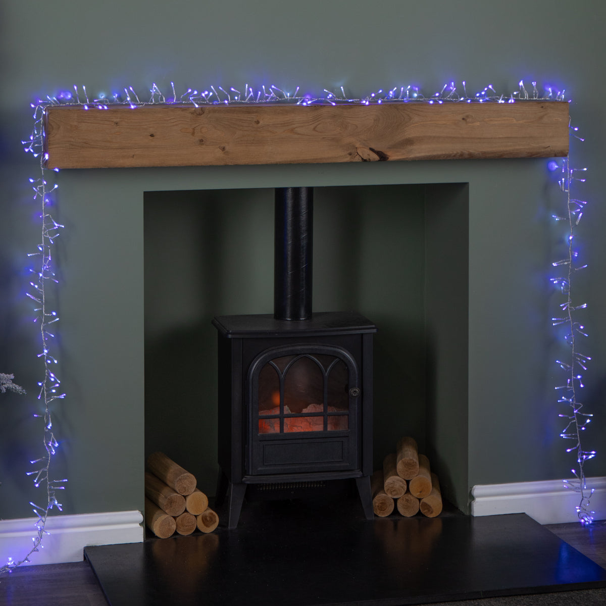 12.4m 960 LED Christmas Cluster Multi-Action String Lights with Timer in Blue, Purple & White on Clear Cable