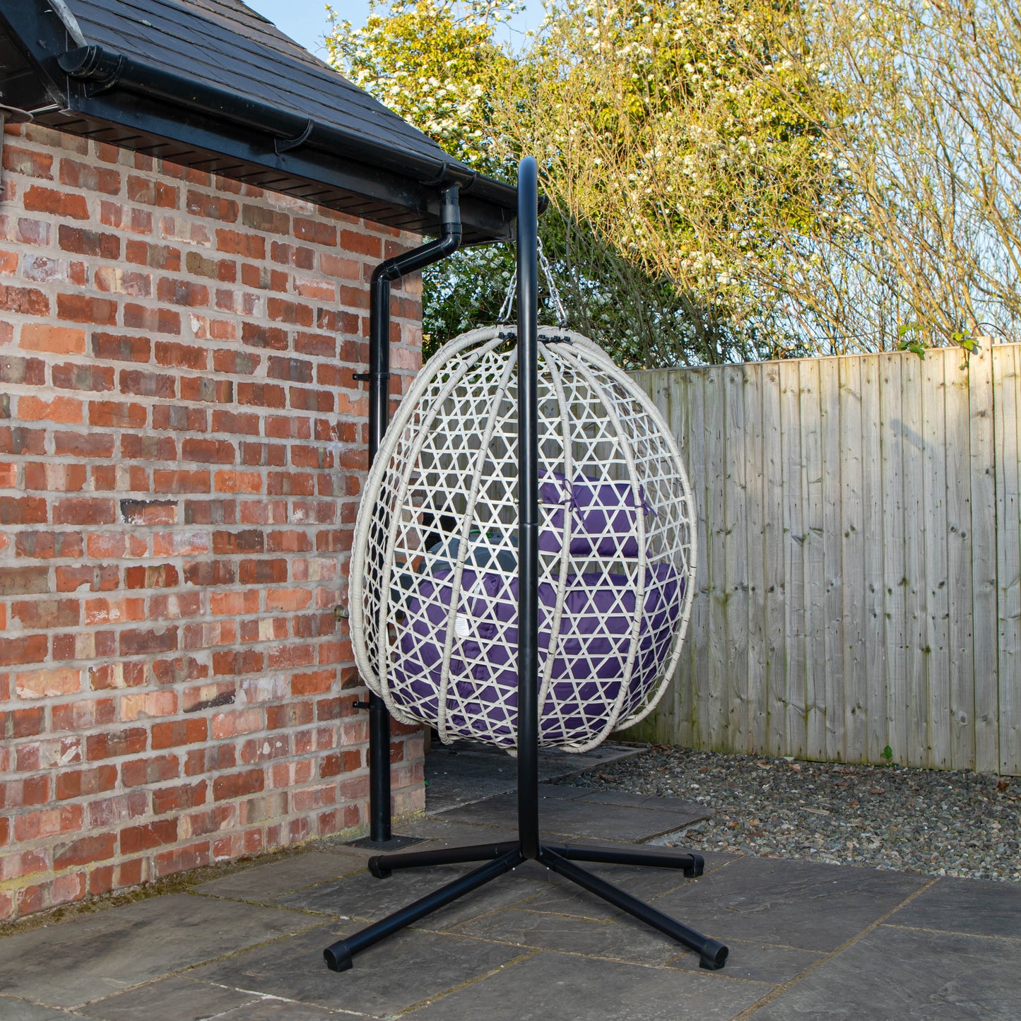 Samuel Alexander Hanging Garden Rattan Egg Chair with Steel Frame and Waterproof Cover in Indigo