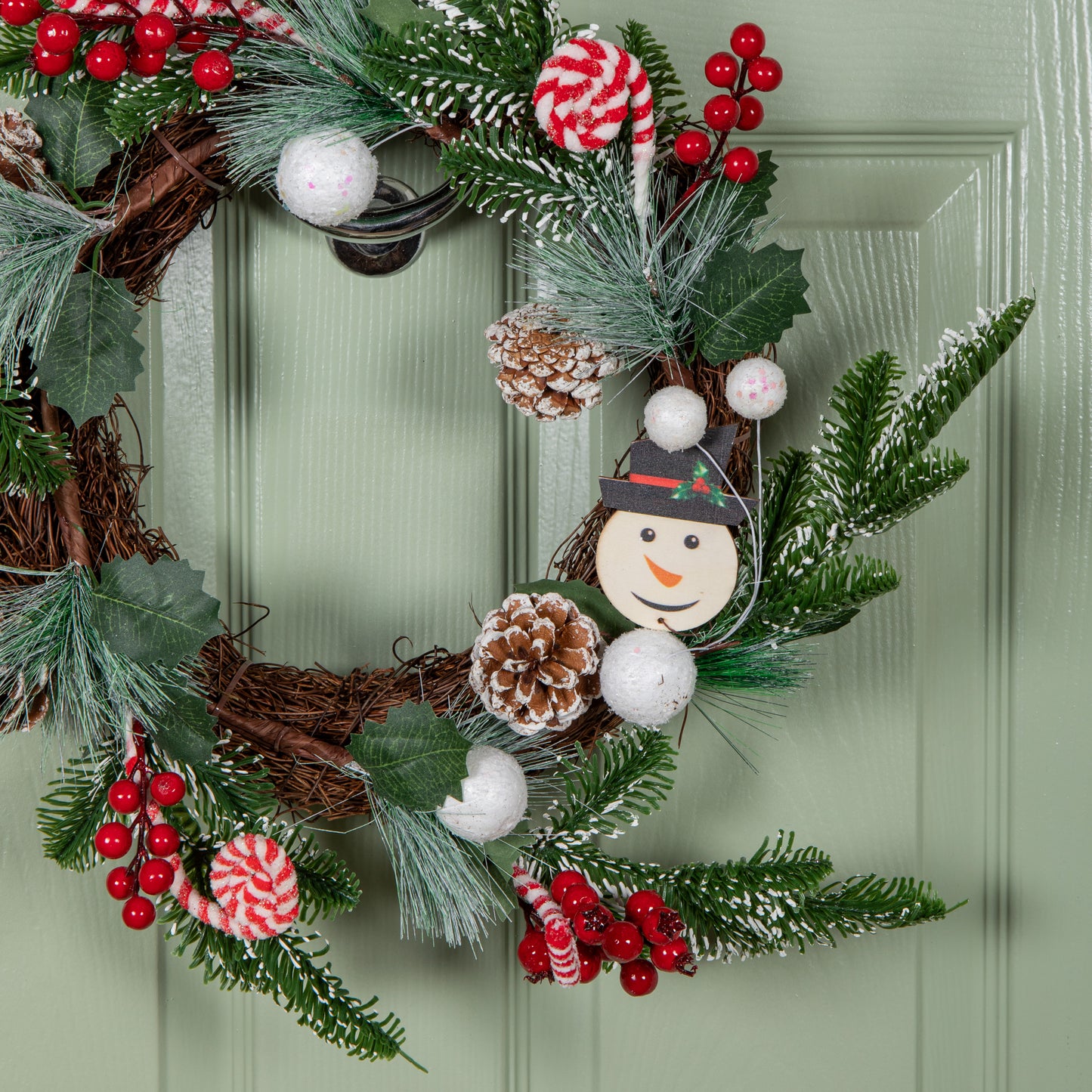 40cm Candy Swirls Christmas Wreath with Pinecones Red Berries and Candy Canes