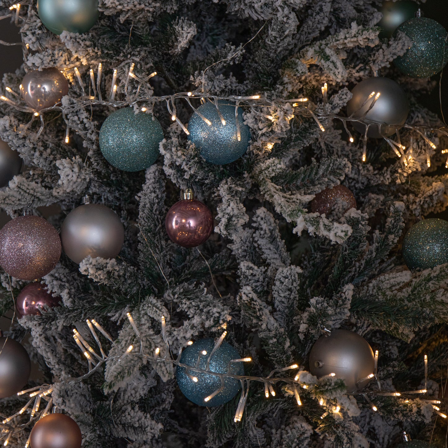 9.3m 720 LED Christmas Cluster String Lights with Timer in Warm White on Clear Cable