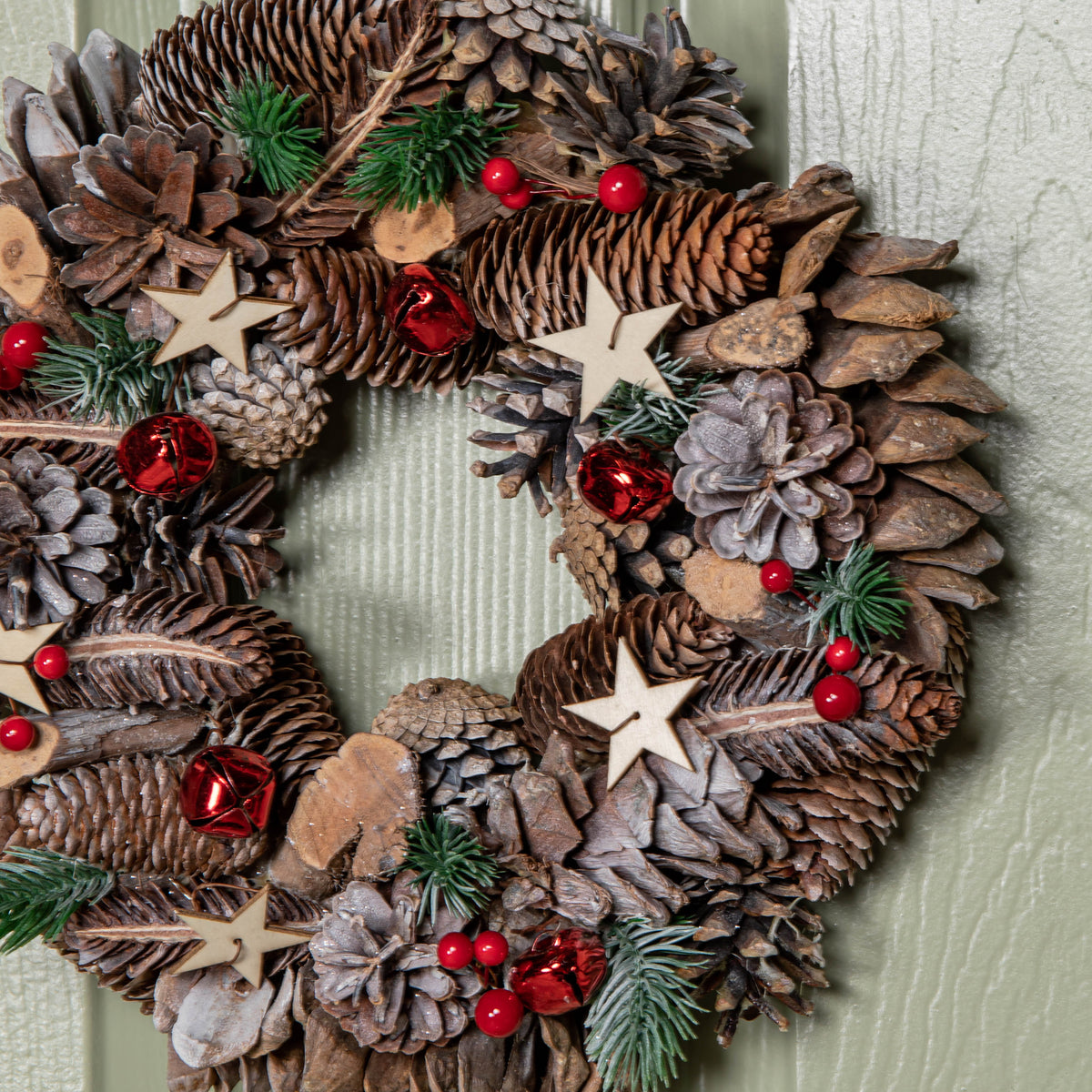 30cm Hanging Christmas Wreath with Red Jingle Bells, Berries and Frosted Stars