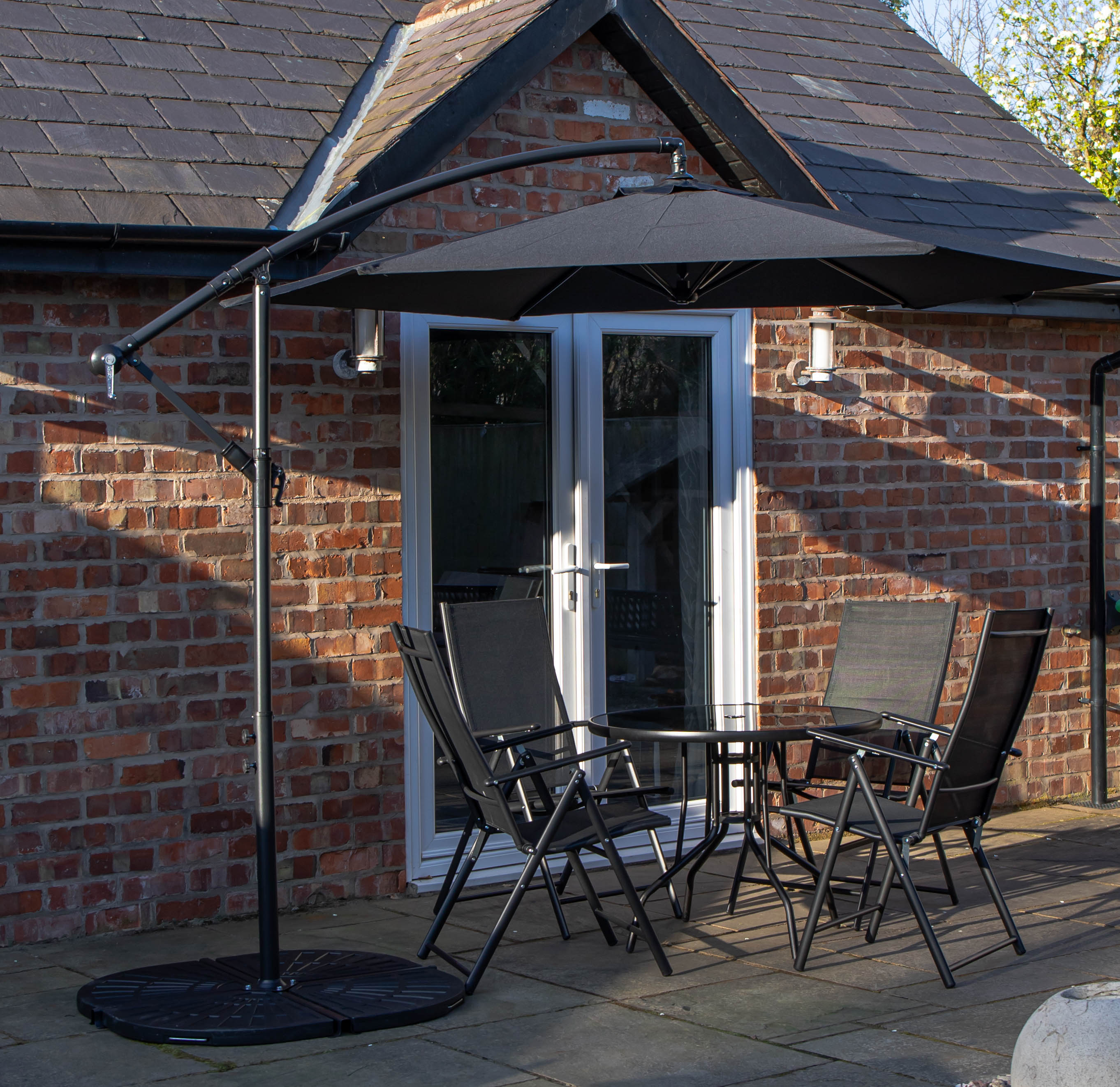 Outdoor 4 Person Round Glass Top Garden Dining Table Chairs With Black Banana Parasol and Base