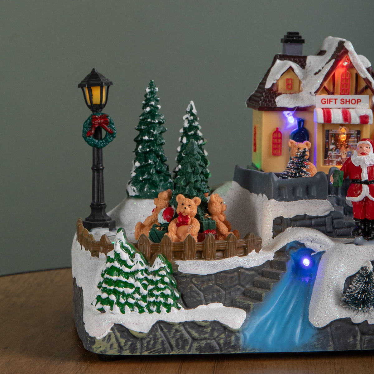 18cm Light up Christmas Gift Shop Snow Scene with Music and LEDs