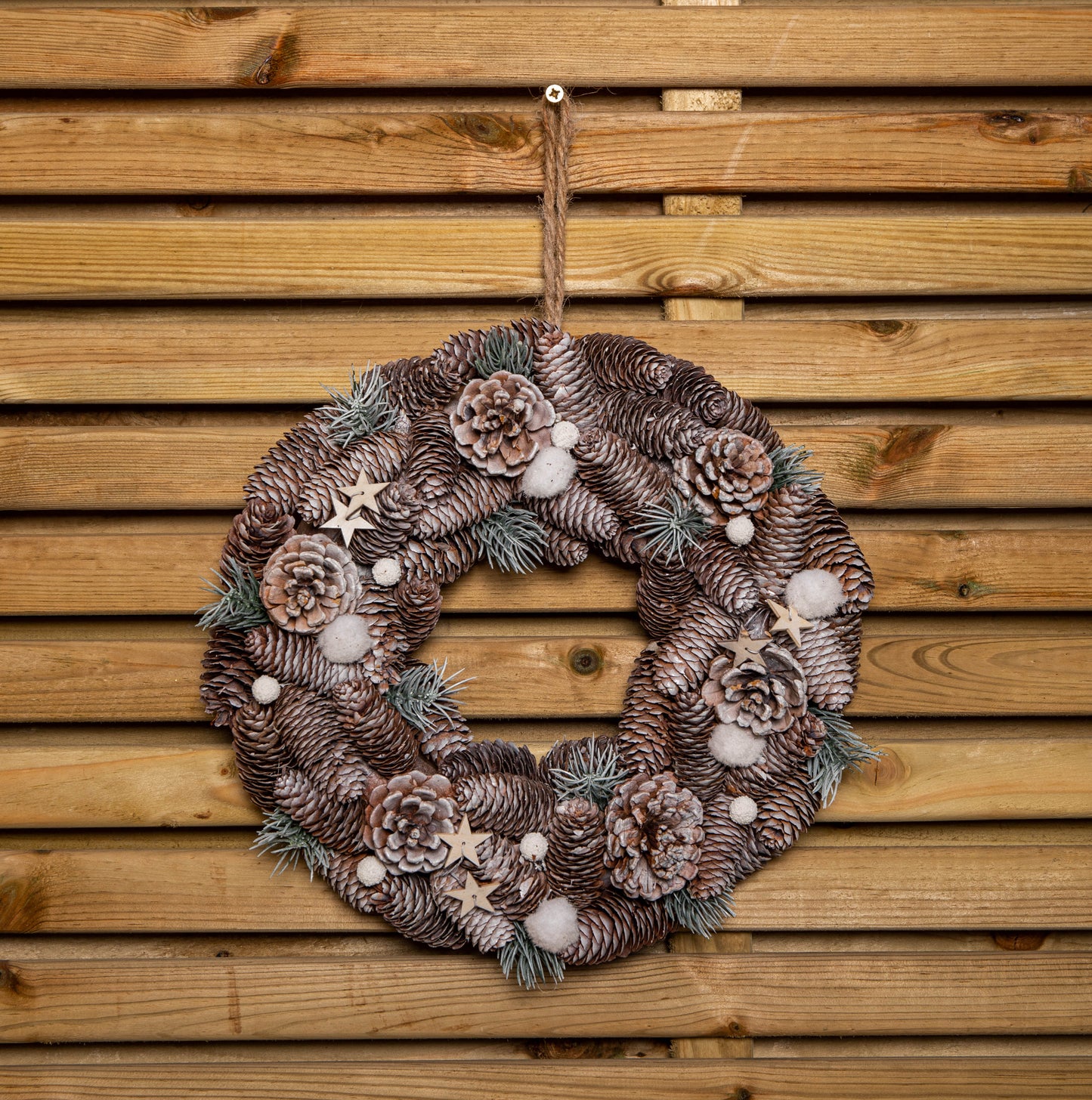 36cm Frosted Hanging Christmas Wreath with Pine Cones & Wooden Stars