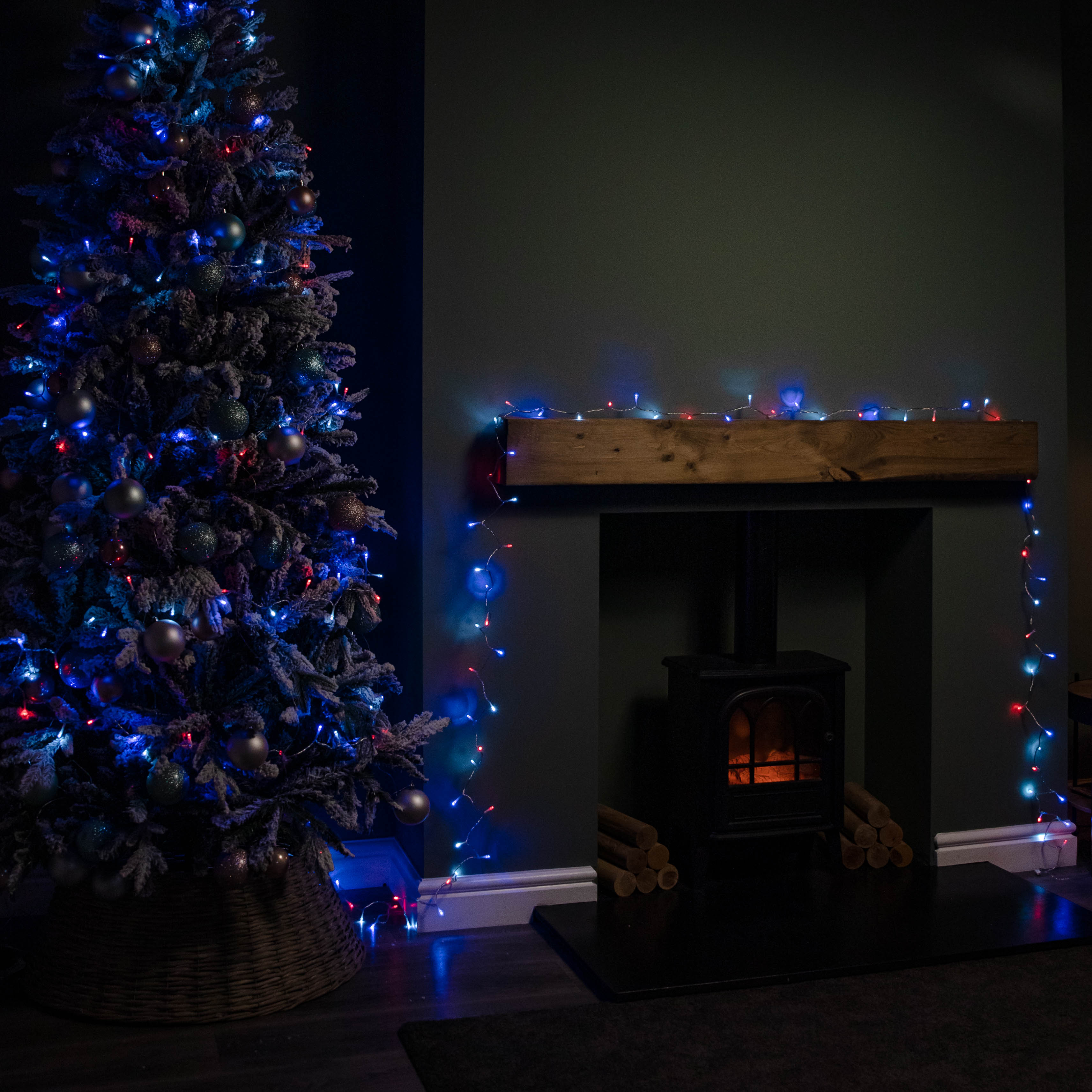 16m 200 LED SupaBrights Multi-Action Christmas String Lights with Timer in Blue, Red & White on Clear Cable