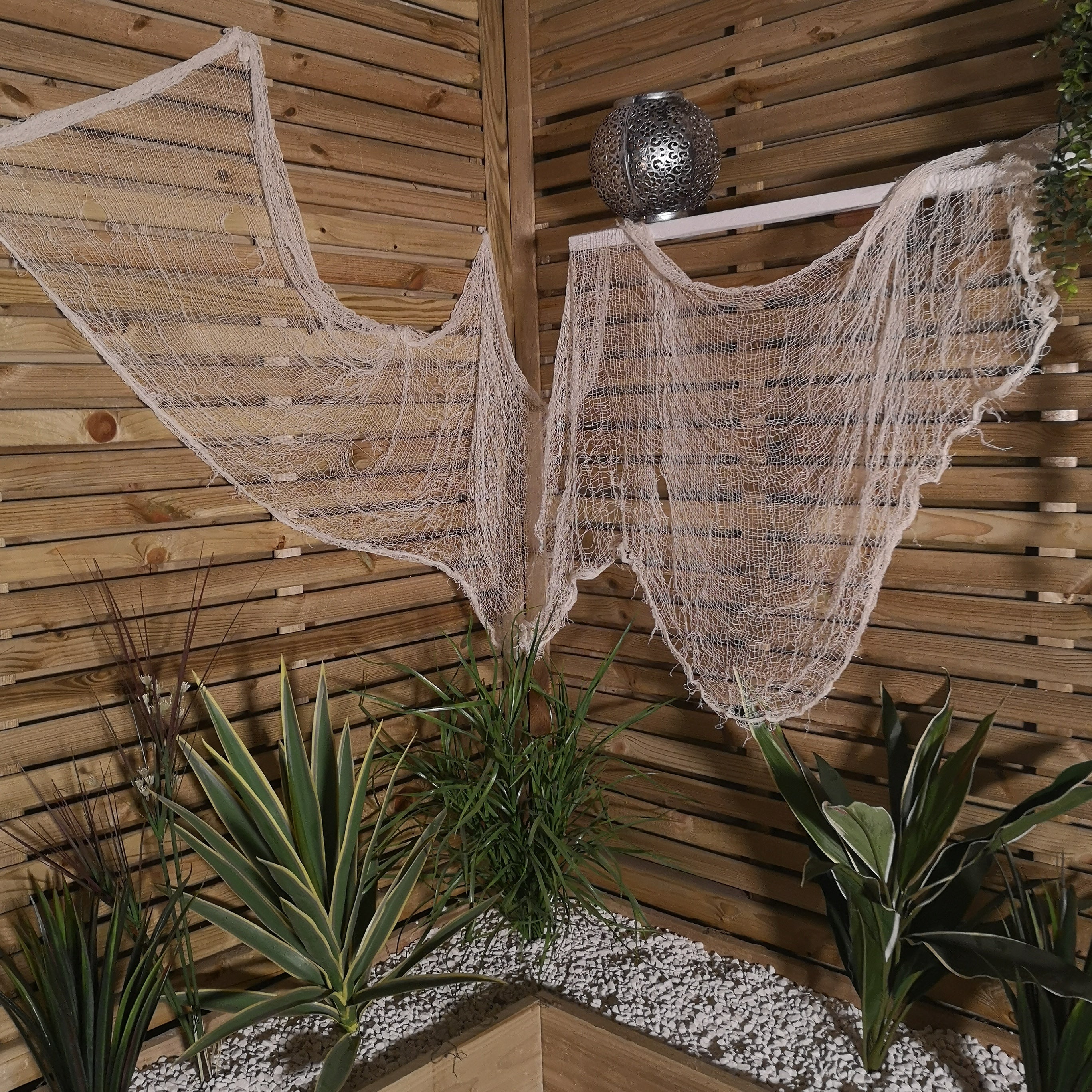 Pack of 12 2.9m Halloween Freaky Fabric Net Decoration in Cream