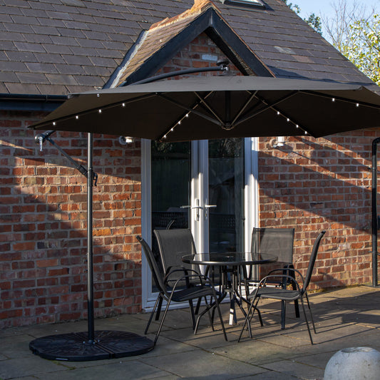 Outdoor 4 Person Round Glass Top Garden Dining Table Chairs With Black Banana Lit Parasol and Base