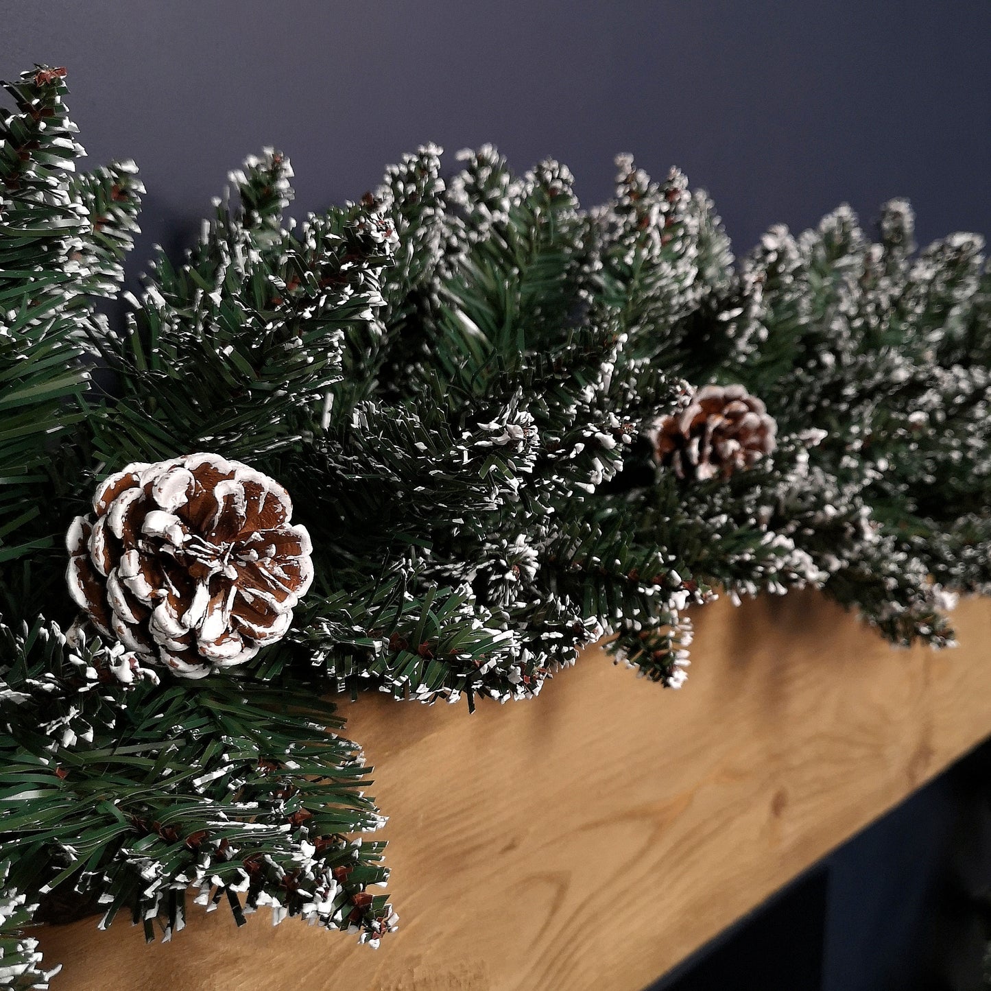 Premier Christmas Rocky Mountain Garland 2.7m  Snow Flocked with Cones