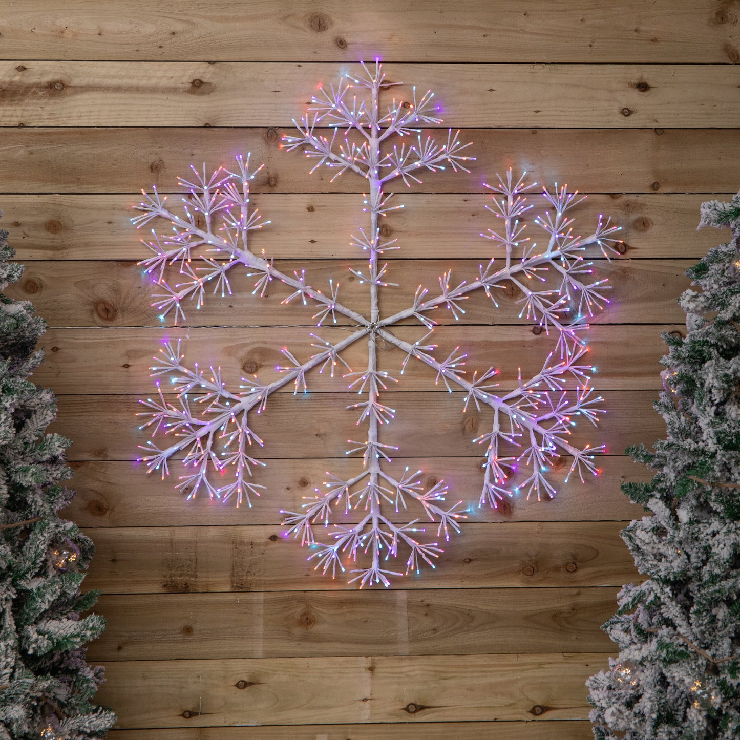 1.2m Twinkling Starburst Snowflake Christmas decoration with 960 Rainbow LEDs