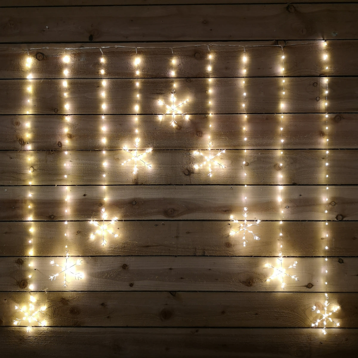 1.2m x 1.2m Premier Christmas Static Snowflake LED Silver Pin Wire V Curtain Lights in Warm White