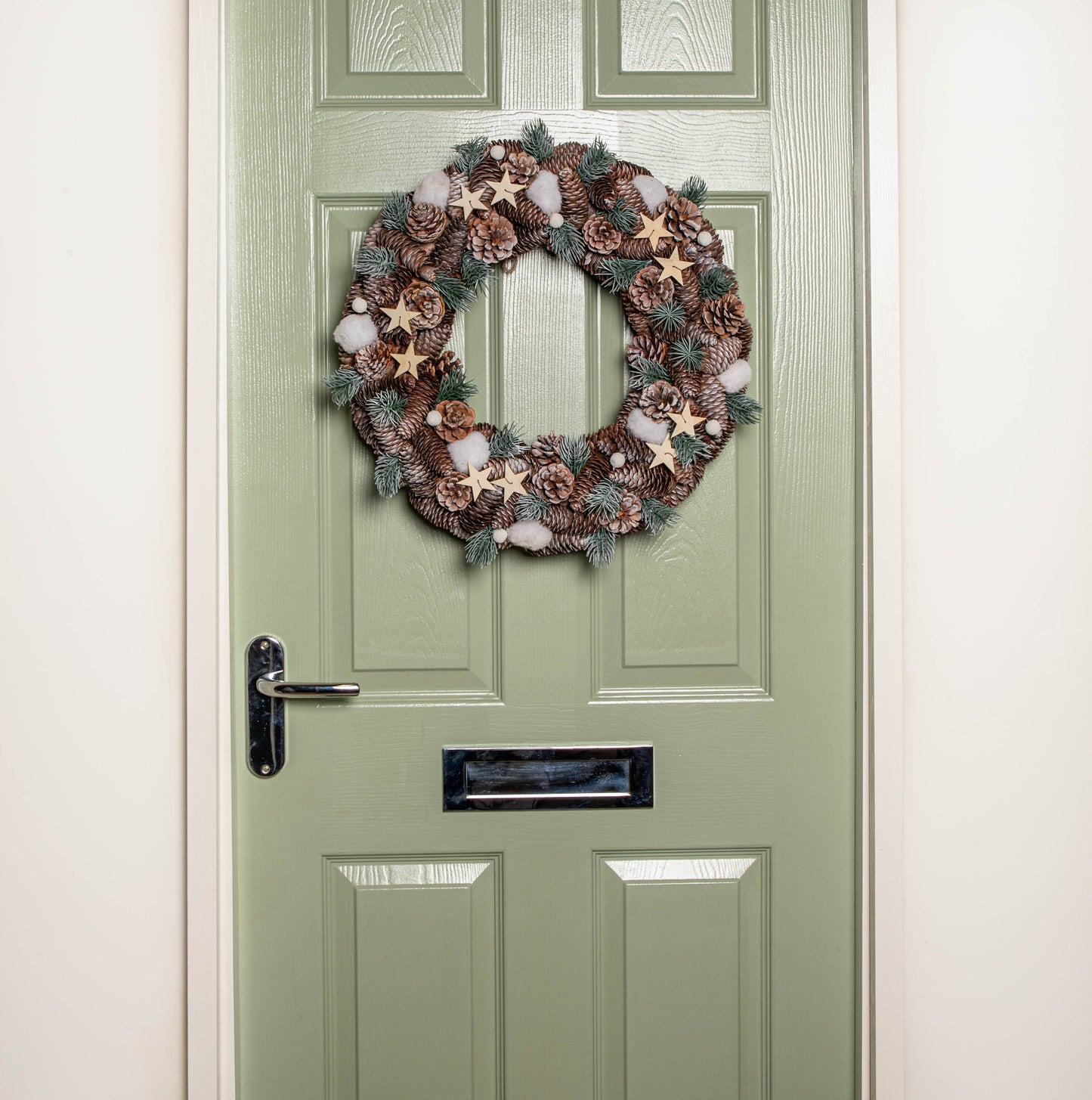50cm Frosted Hanging Christmas Wreath with Pine Cones & Wooden Stars