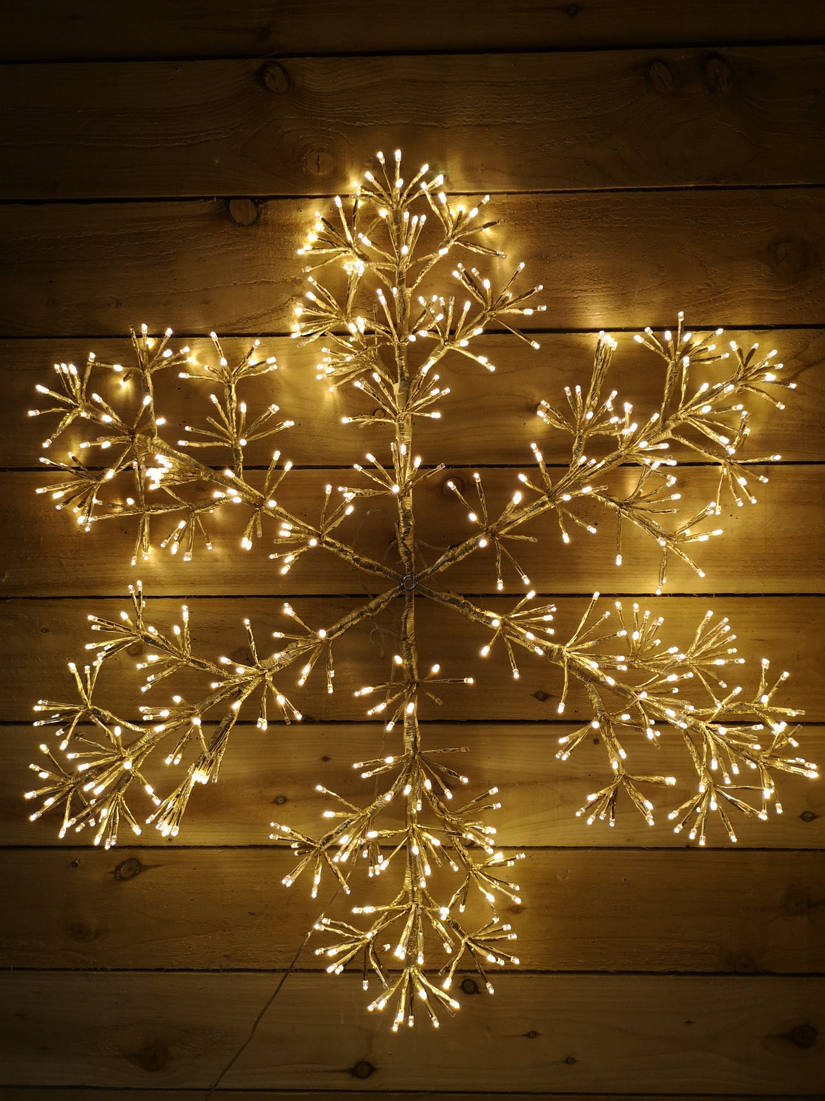 Premier 90cm Gold Starburst Snowflake Wall Window Decoration With 660 Warm White LEDs